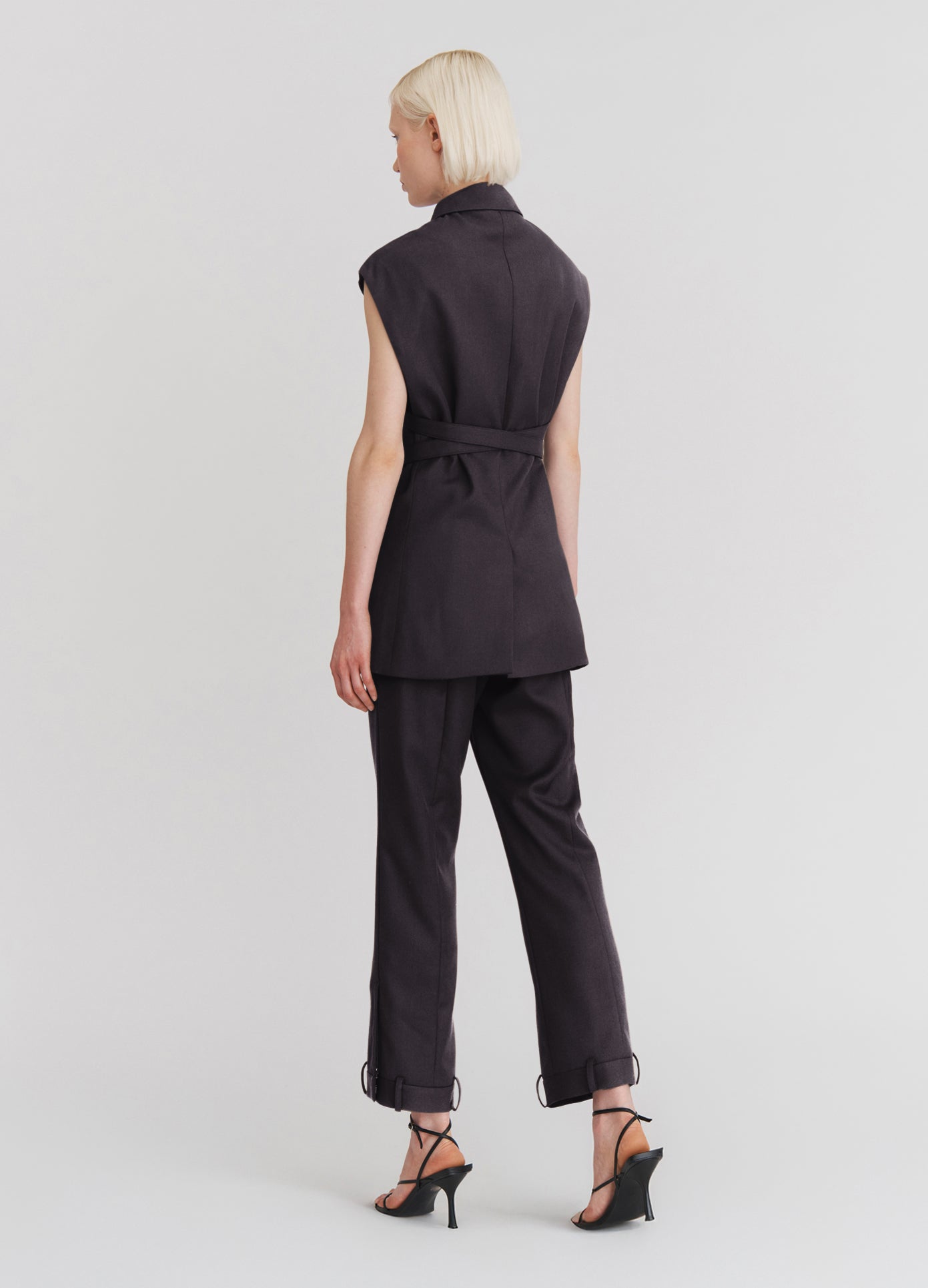 MONSE Deconstructed Tuxedo Trousers in Black on model full back view