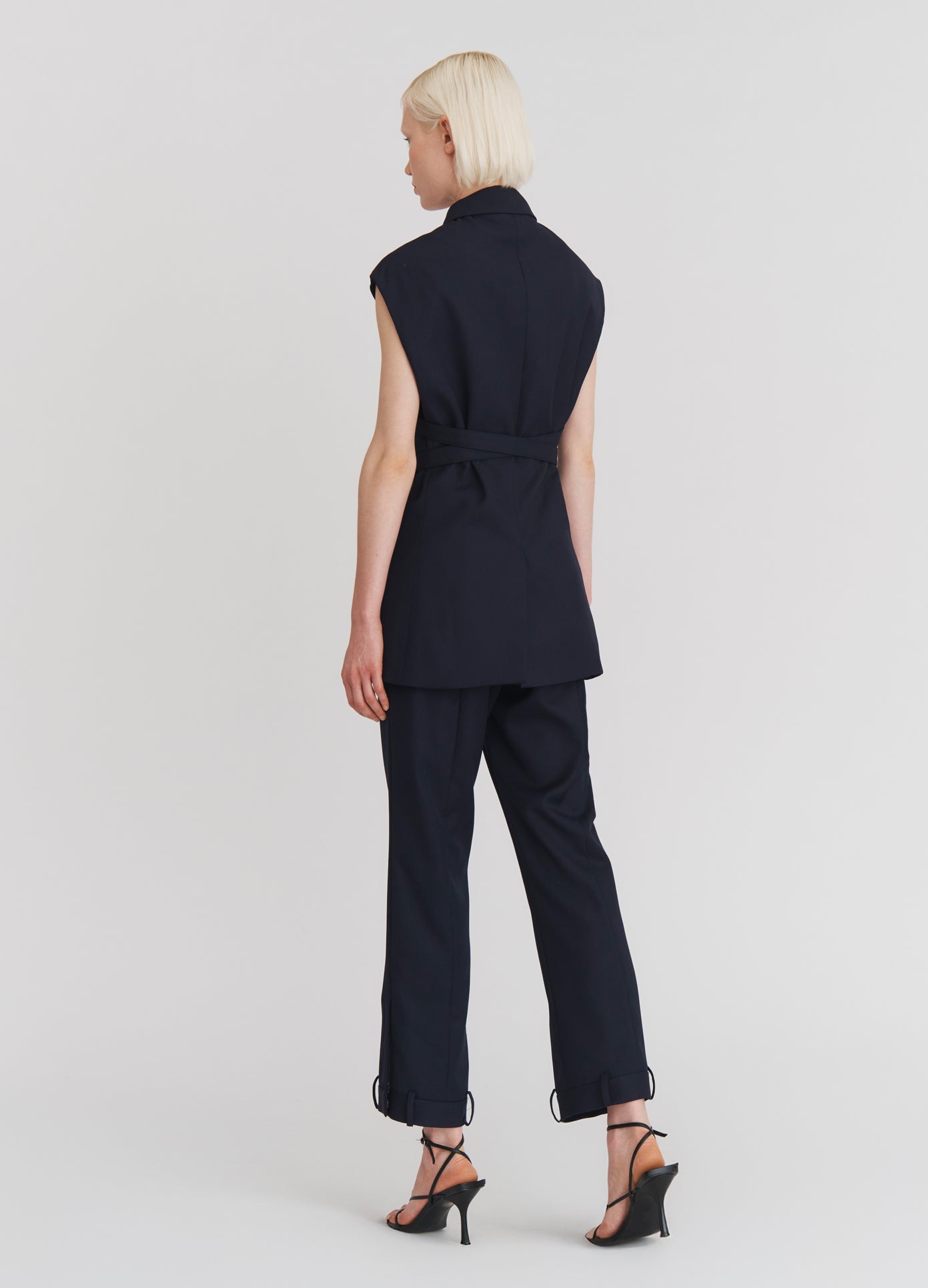 MONSE Deconstructed Tuxedo Trousers in Midnight on model full back view