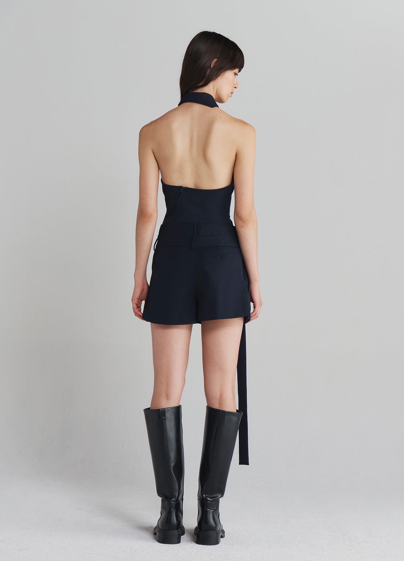 MONSE Deconstructed Wrap Tailored Shorts in Navy on model full back view