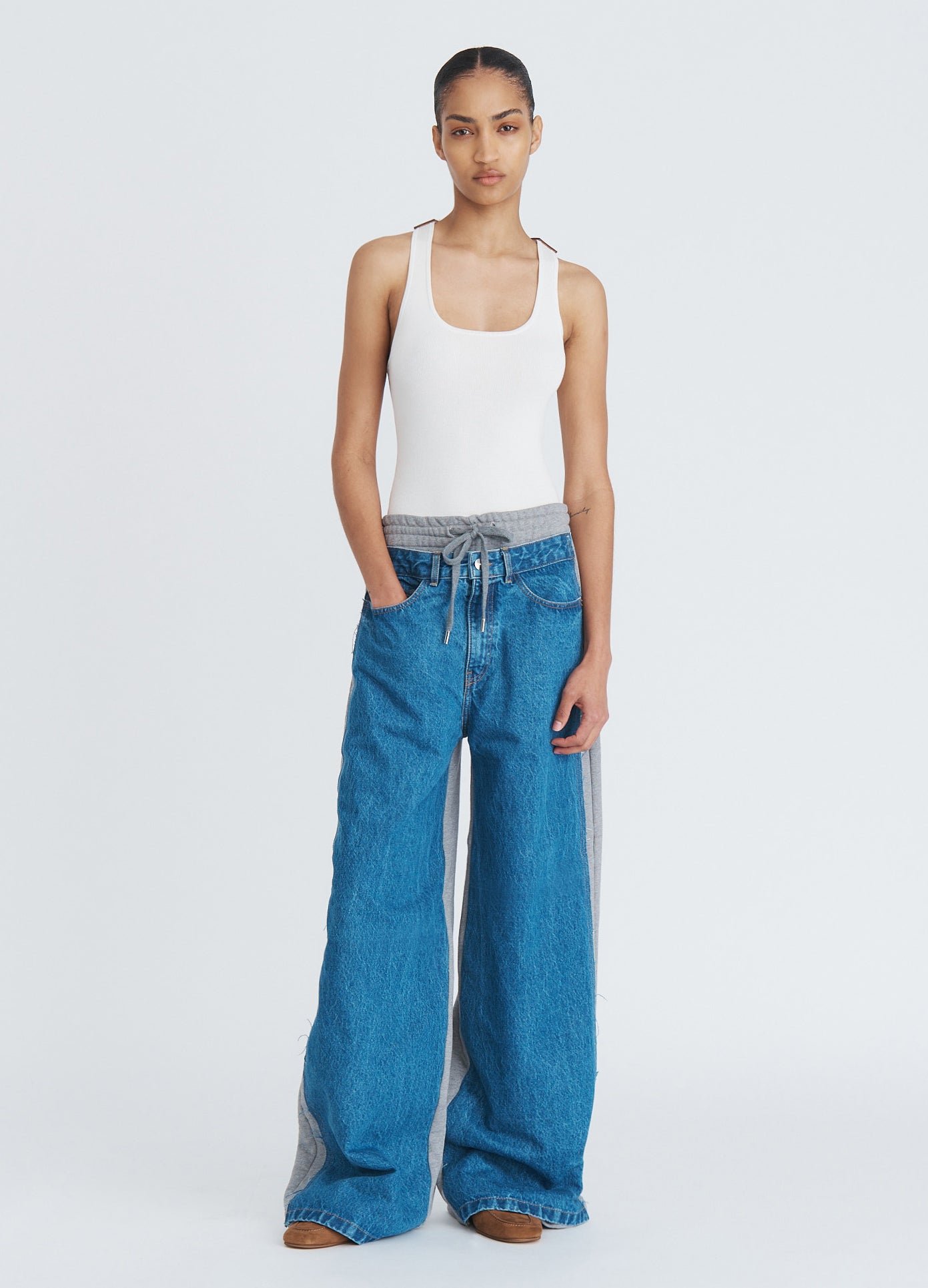 MONSE Denim Combo Sweatpants in indigo on model full front view