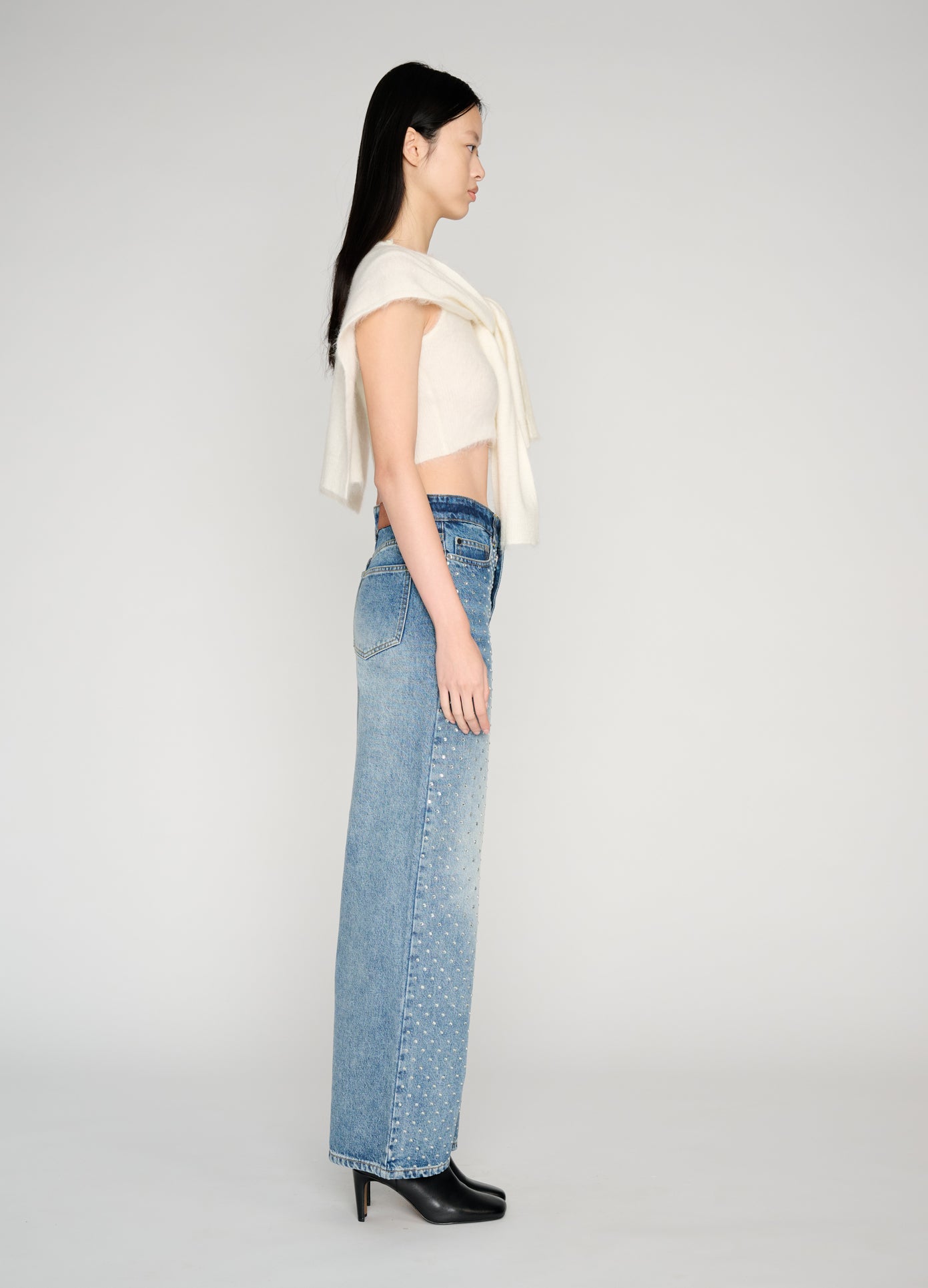 MONSE Denim Jean With Crystal Studs in indigo on model full side view