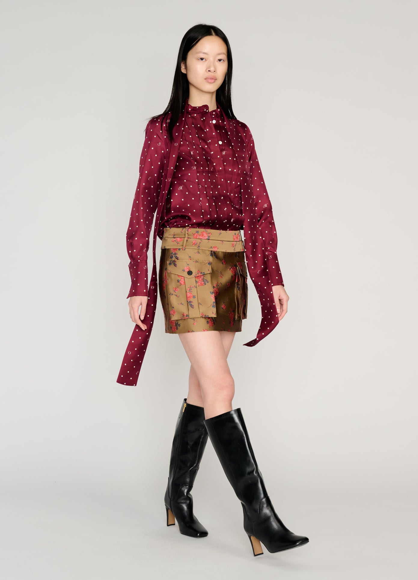 MONSE Double Waistband Cargo Skirt in brown on model walking full front view