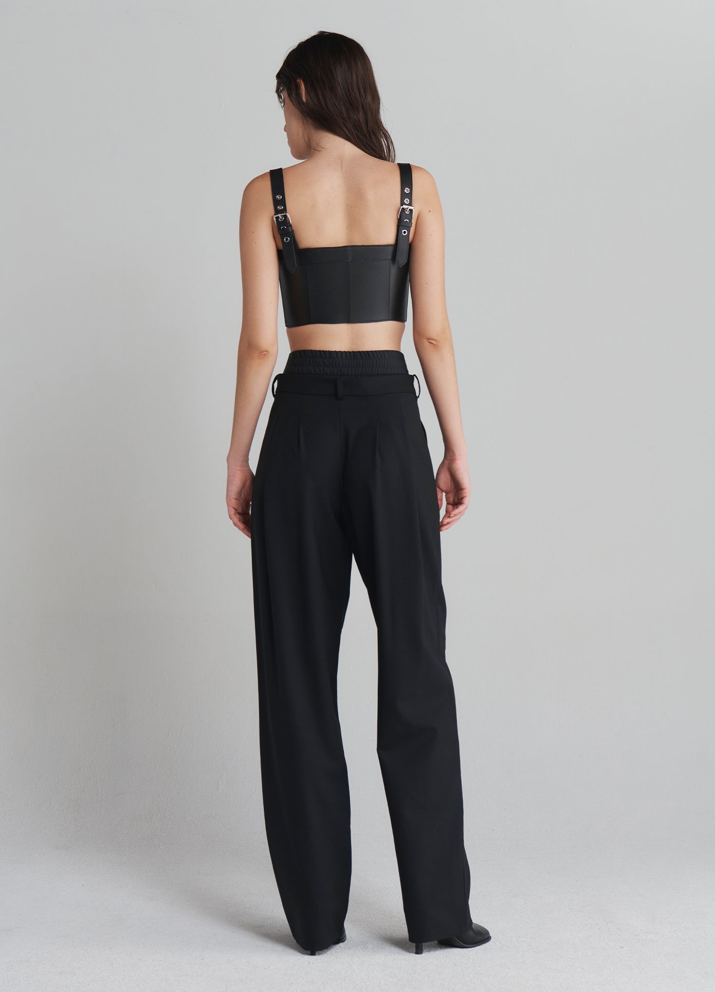 MONSE Double Waistband Trousers in Black on model full back view