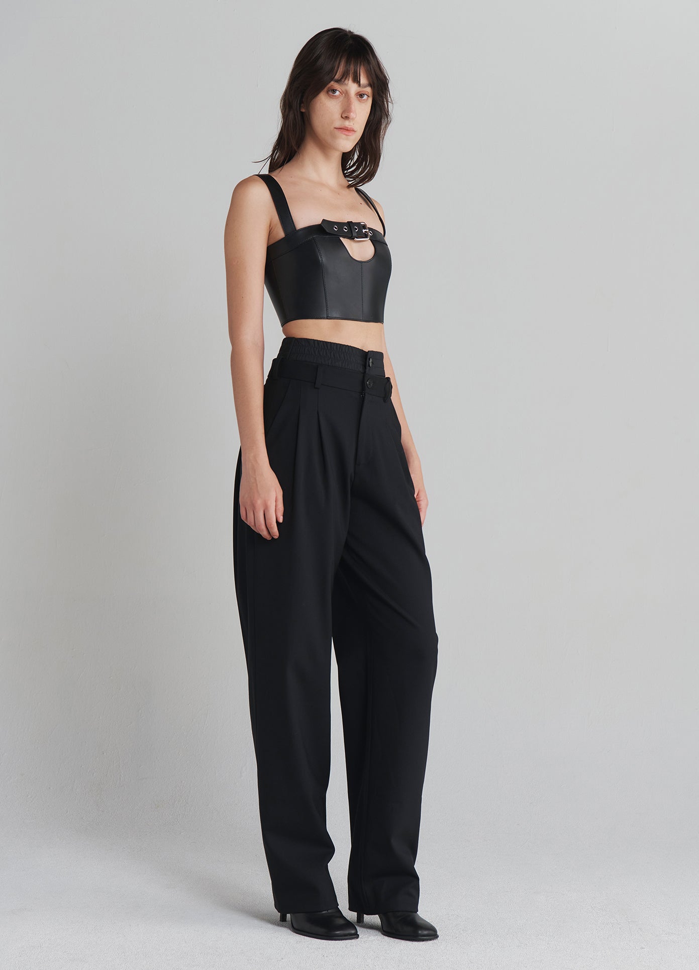 MONSE Double Waistband Trousers in Black on model full side view