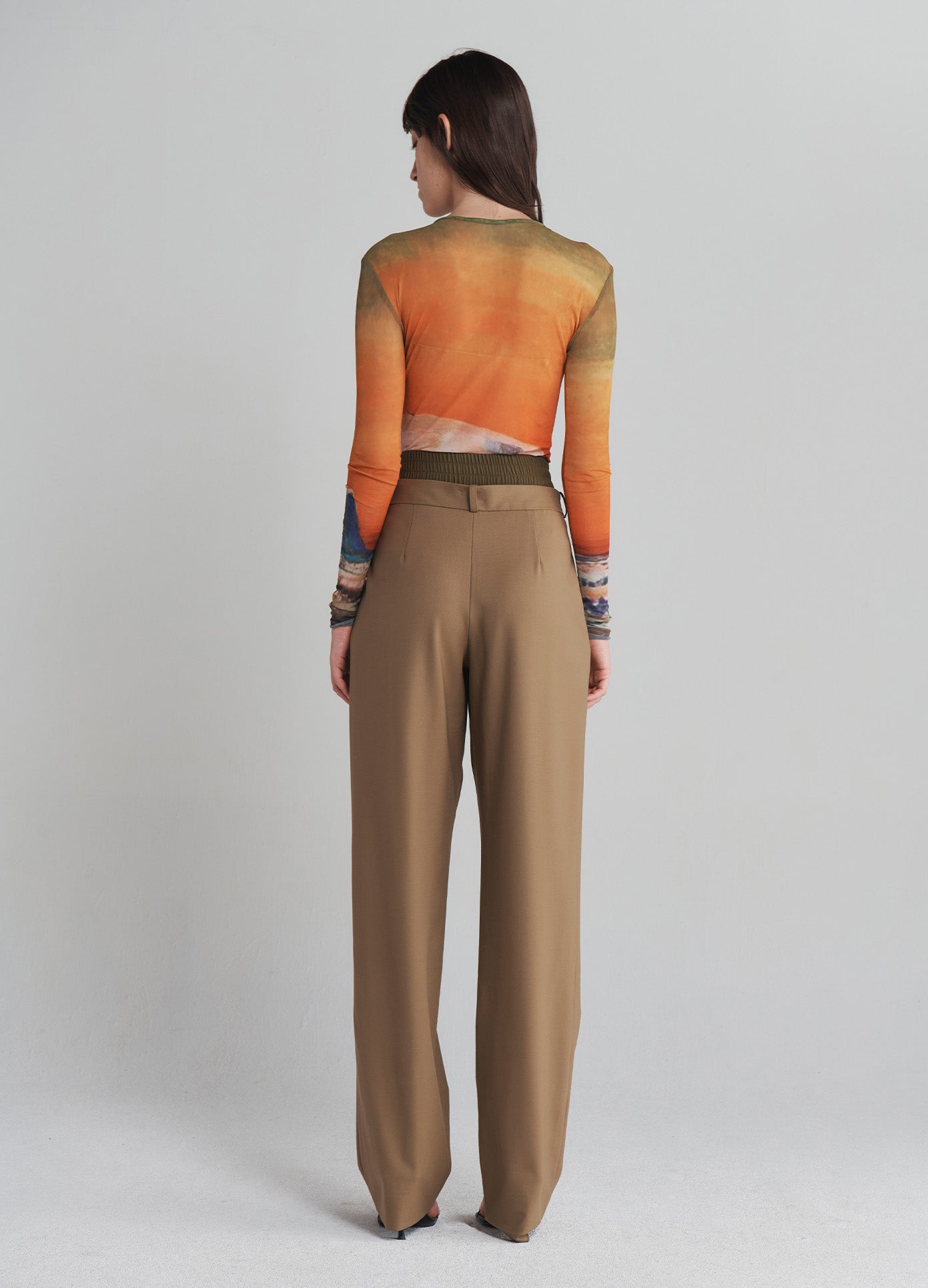 MONSE Double Waistband Trousers in Dark Khaki on model with shirt tucked in full back view