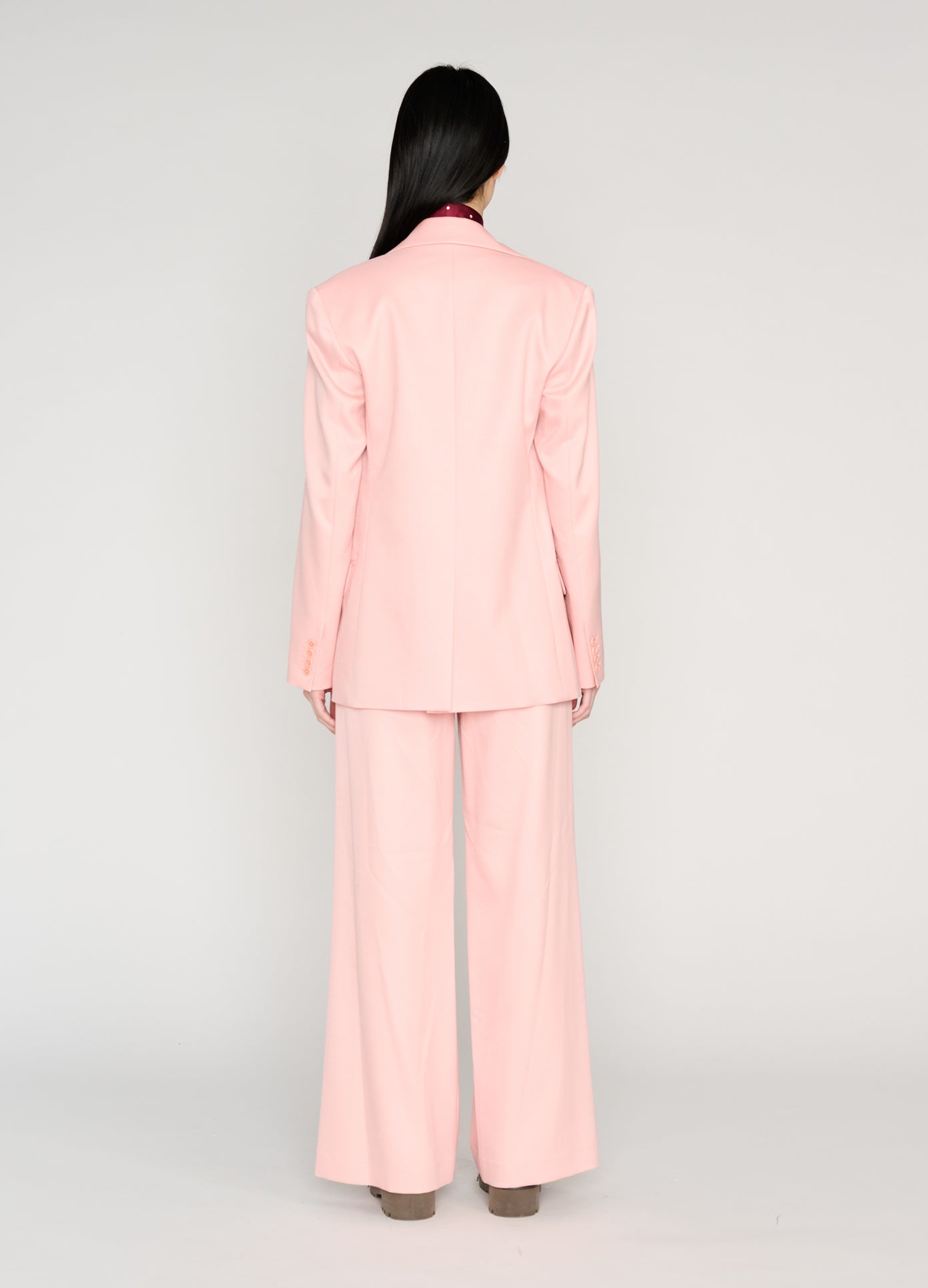 MONSE Double Waistband Trousers in pink on model full back view