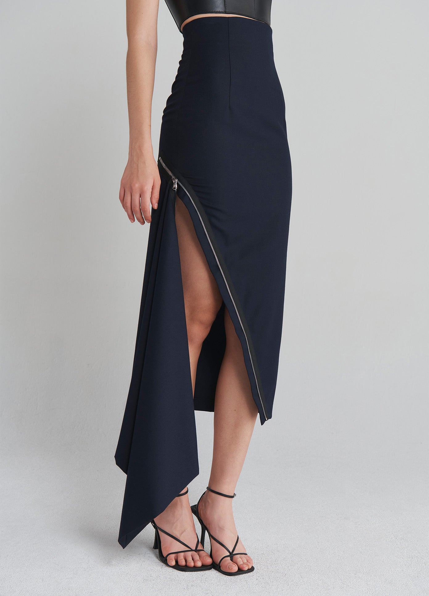 MONSE Double Zipper Midi Skirt in Navy on model front bottom view