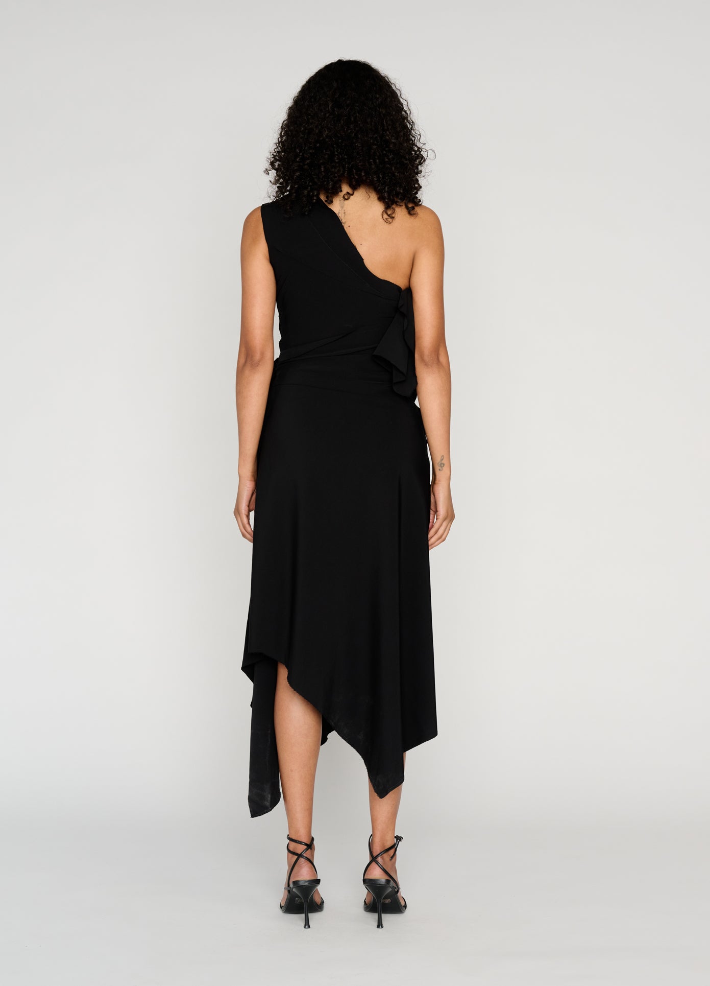 MONSE Draped Towel Dress in black on model full back view