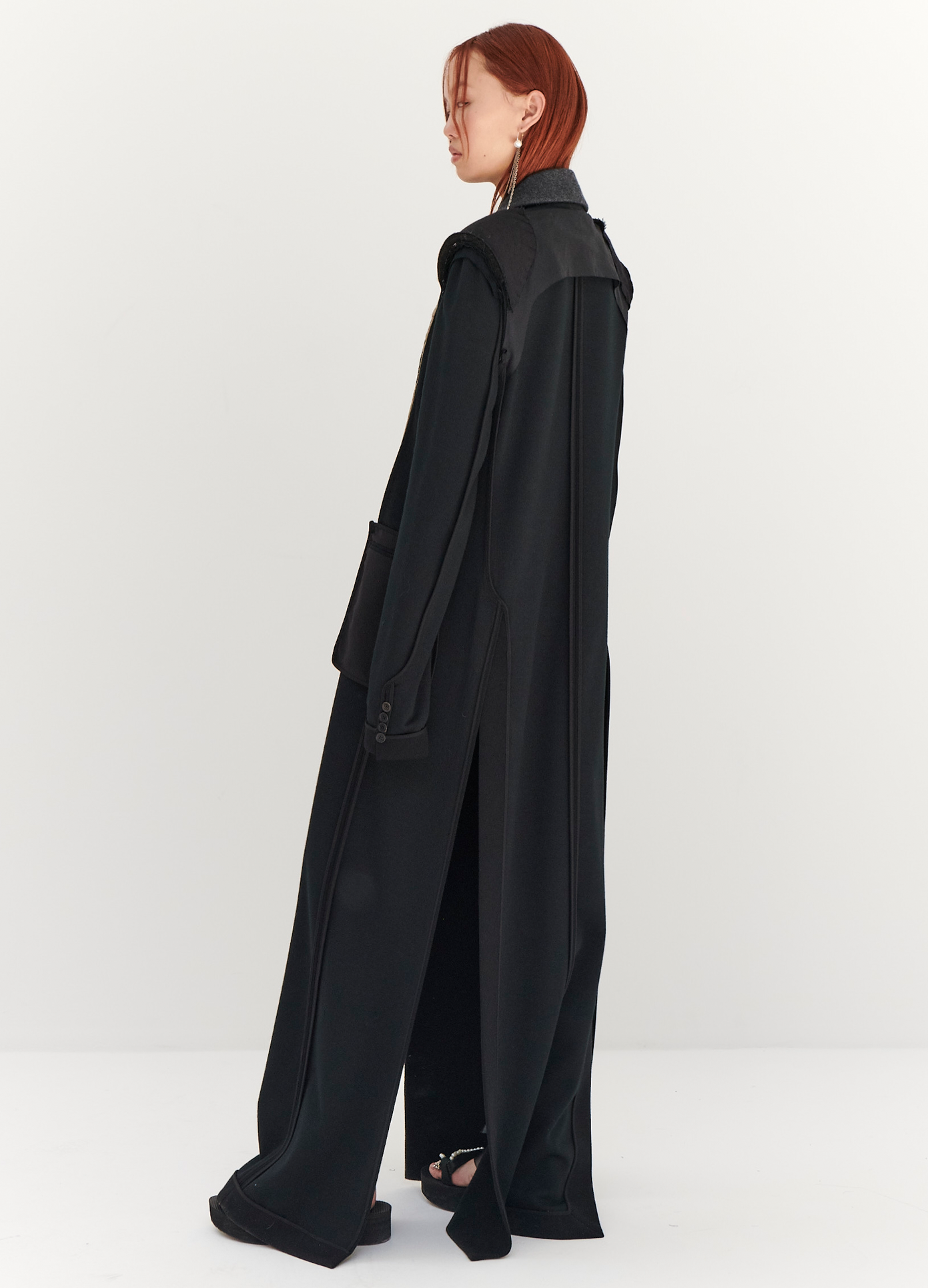 MONSE Floor Length Reversed Coat in Black on model full back side view