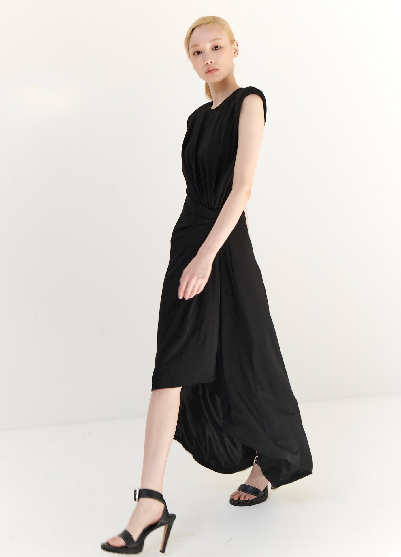 MONSE Gathered Power Shoulder Dress in Black on Model Walking Side View