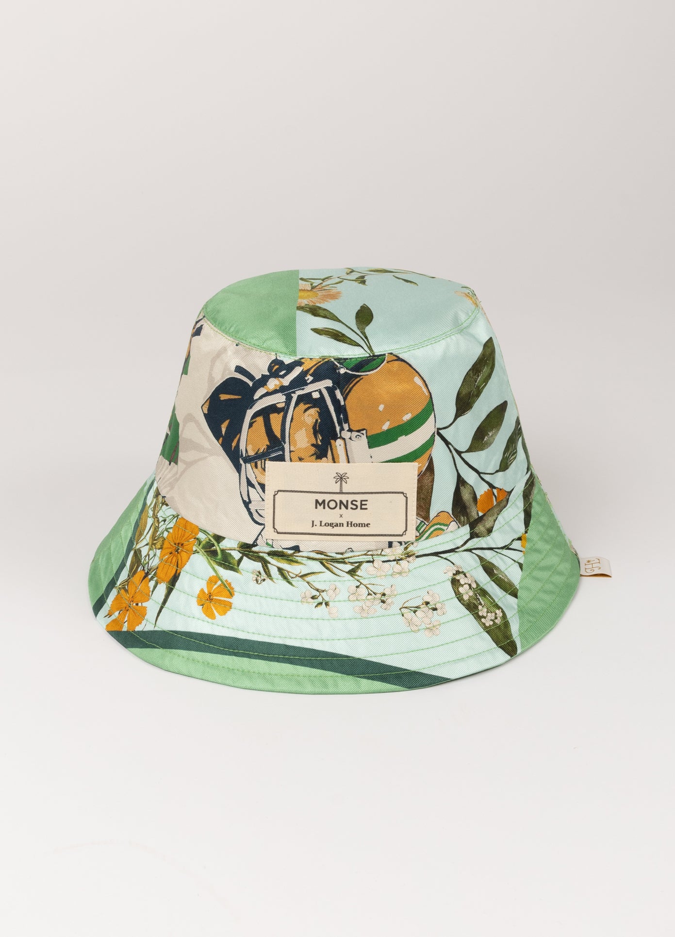MONSE x J. Logan Home Silk Hat in green multi front view