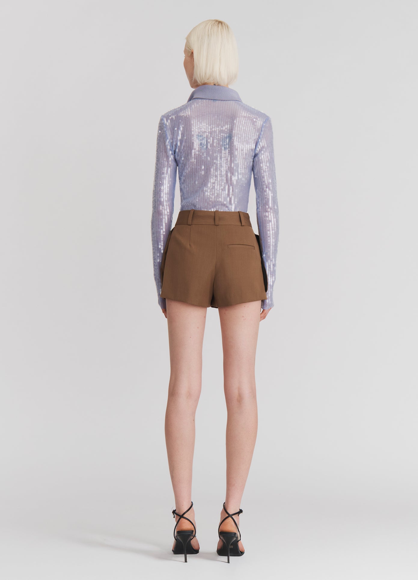 MONSE Jacket Hem Shorts in Beige on model full back view