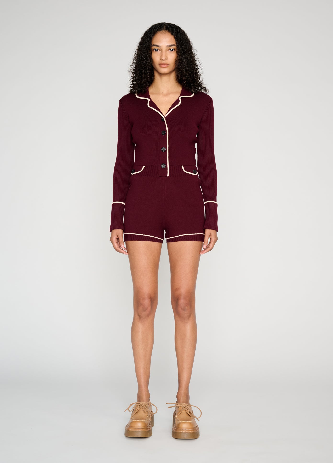 MONSE Knitted Pajama Romper in burgundy on model full front view