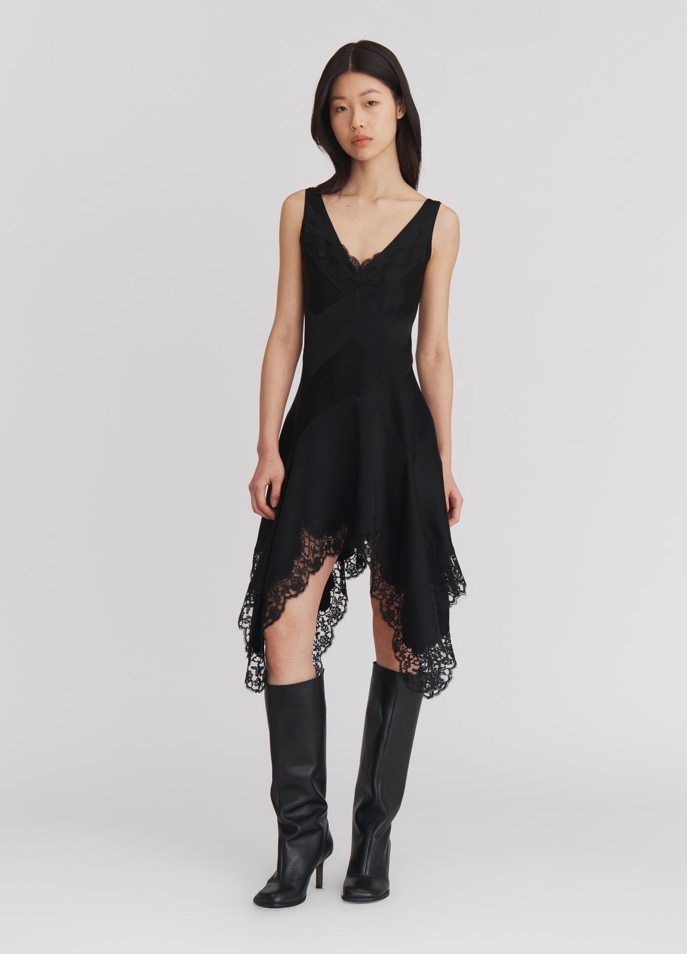 MONSE Lace Triangle Flared Mini Dress in Black on model alternate full front view