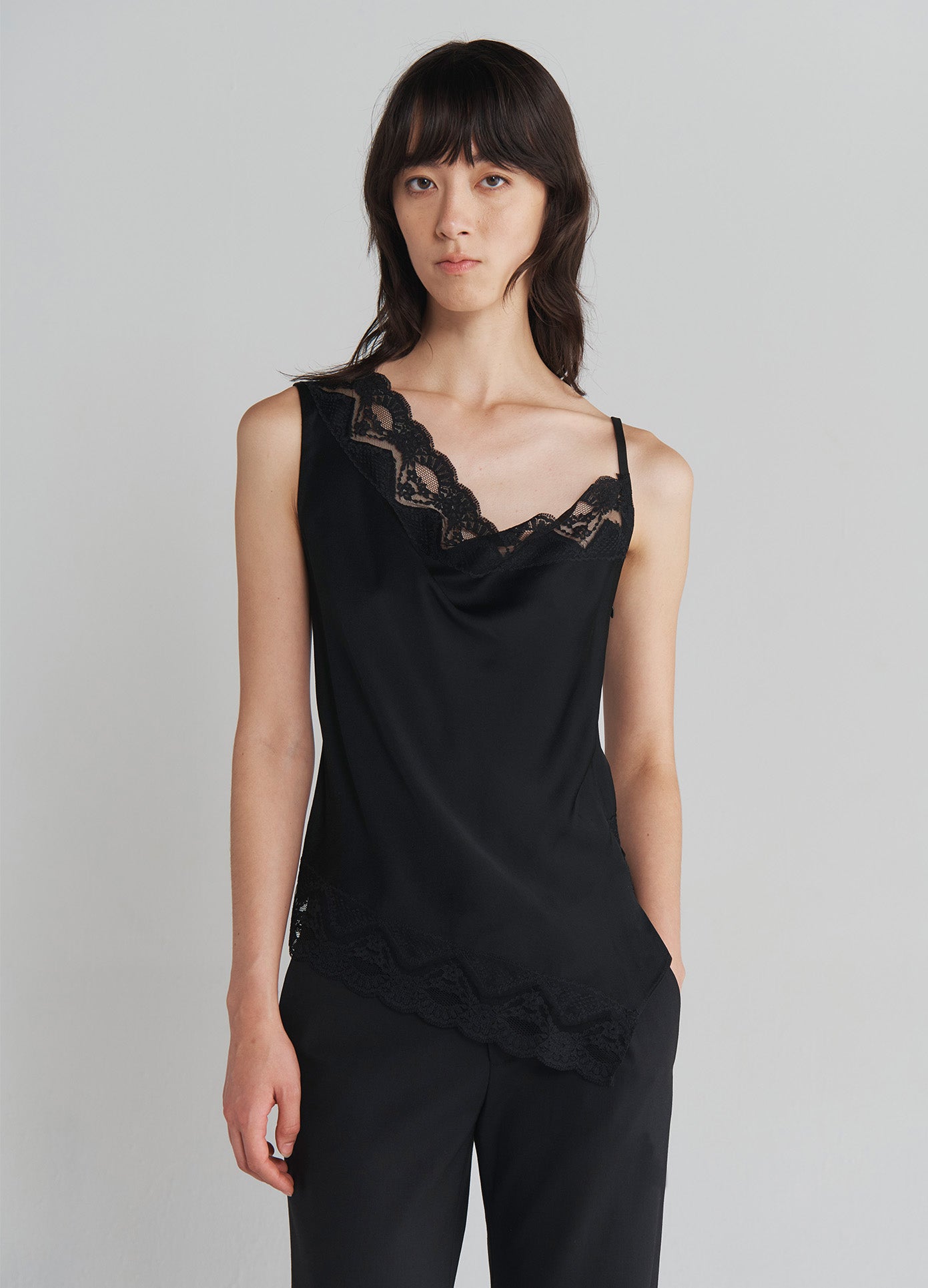 MONSE Lace Trim Camisole Top in Black on model front view