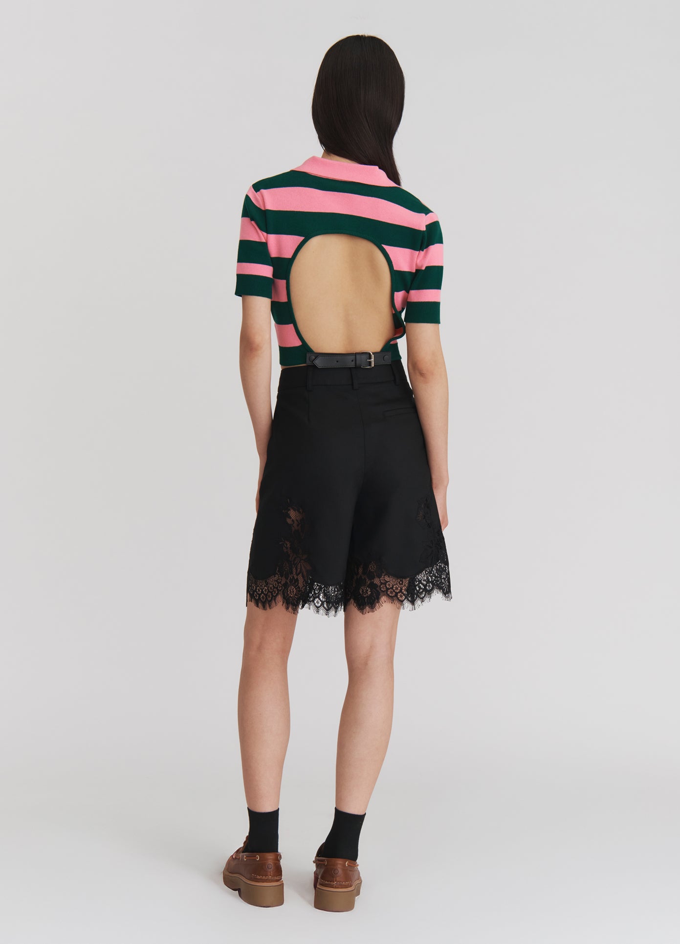 MONSE Lace Trimmed Tailored Shorts in Black on model full back view