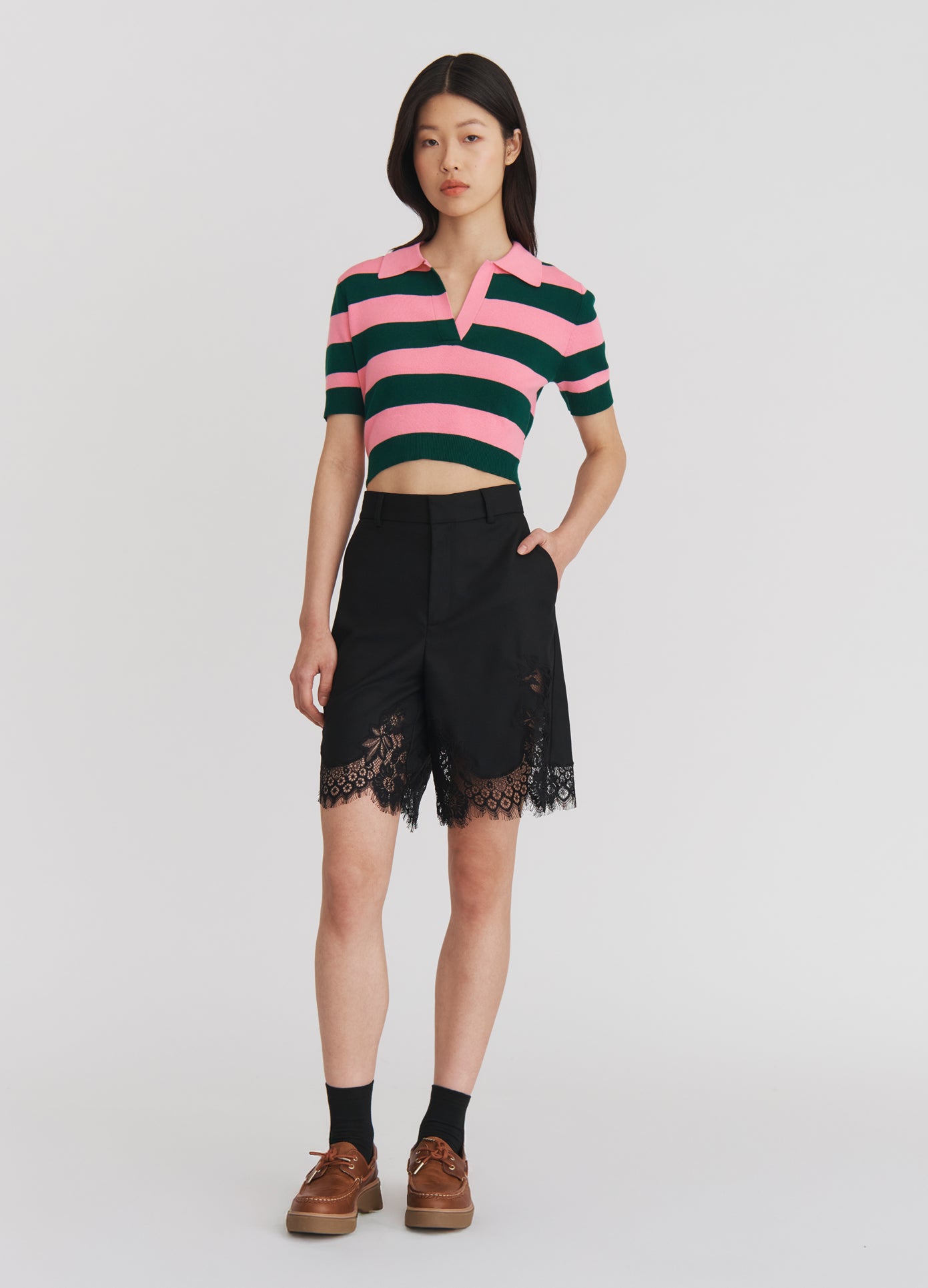 MONSE Lace Trimmed Tailored Shorts in Black on model full front view