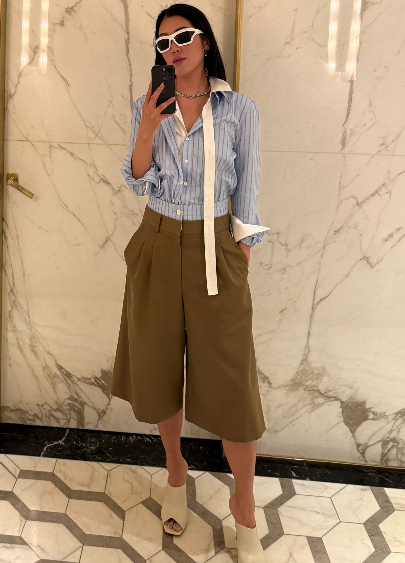 MONSE's Laura Kim wearing the Double Waistband Wide Leg Shorts