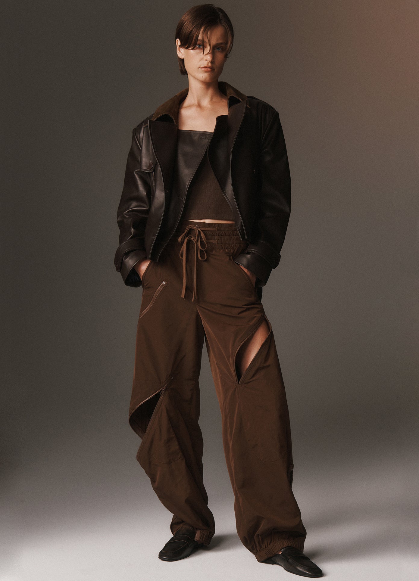 MONSE Layering Cropped Leather Trench Coat in brown on model lookbook image