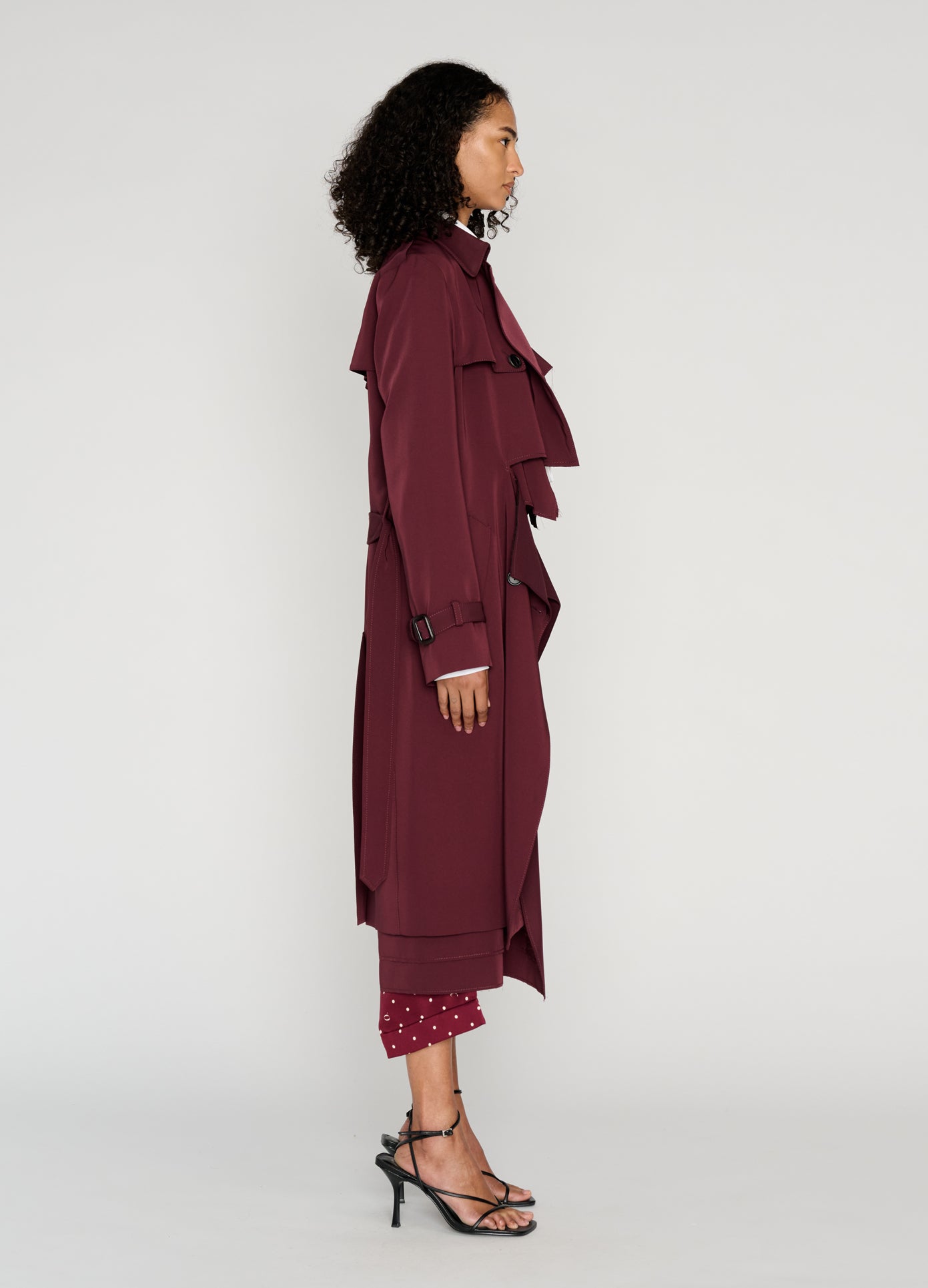MONSE Layering Trench Coat in burgundy on model full side view