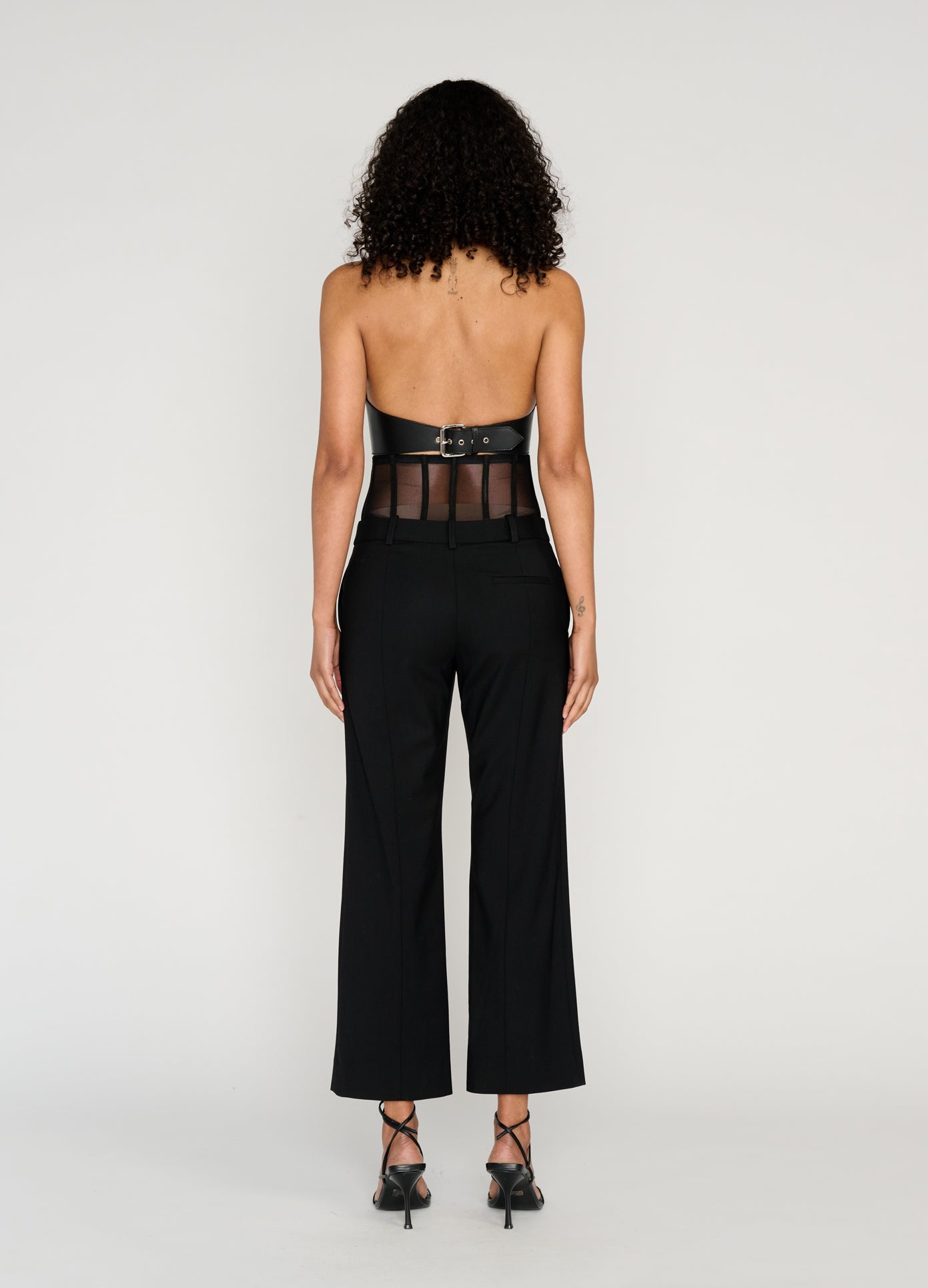 MONSE Leather Halter Top in black on model full back view