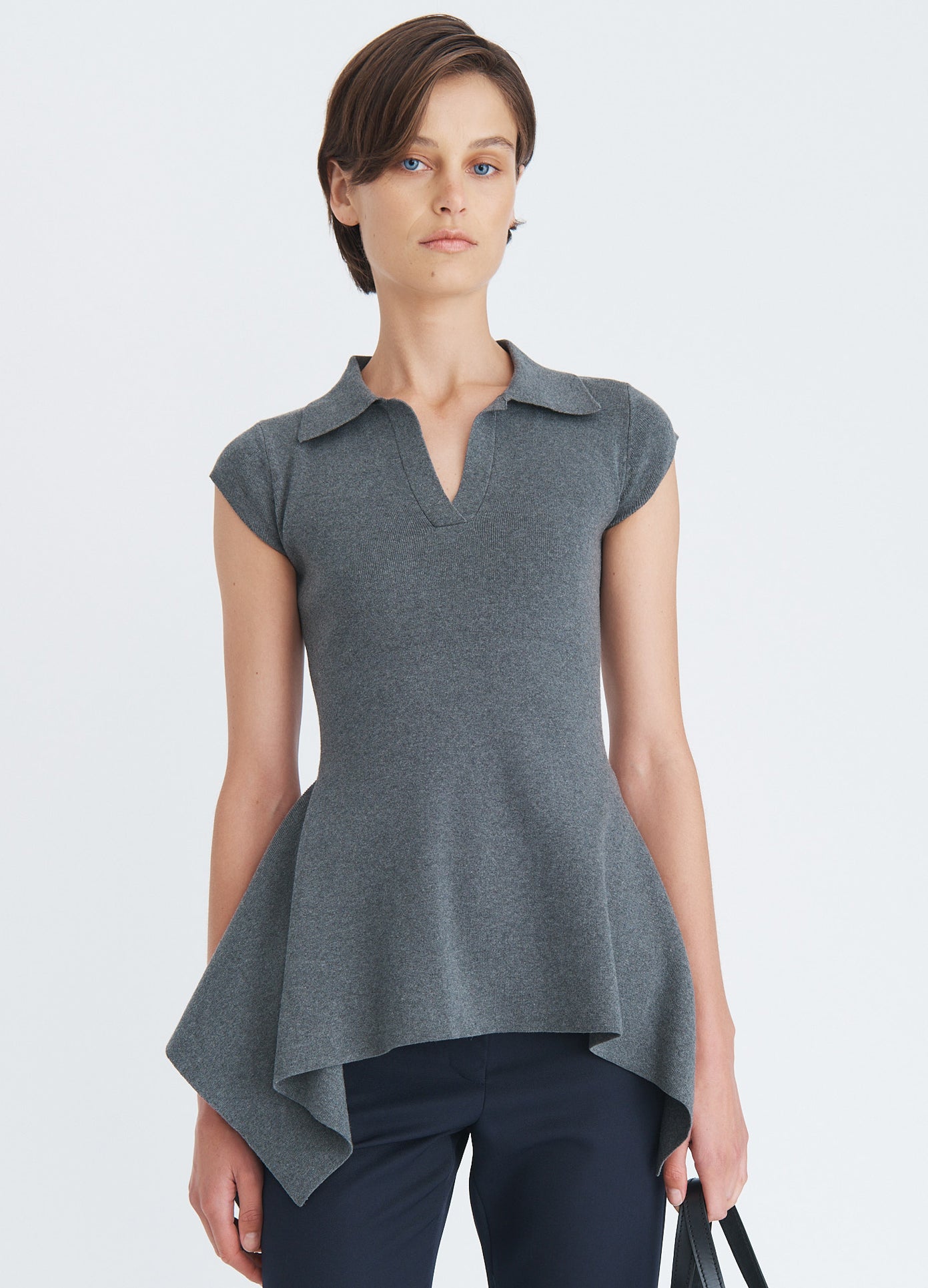 MONSE Napkin Hem Polo Knit Top in charcoal on model front view