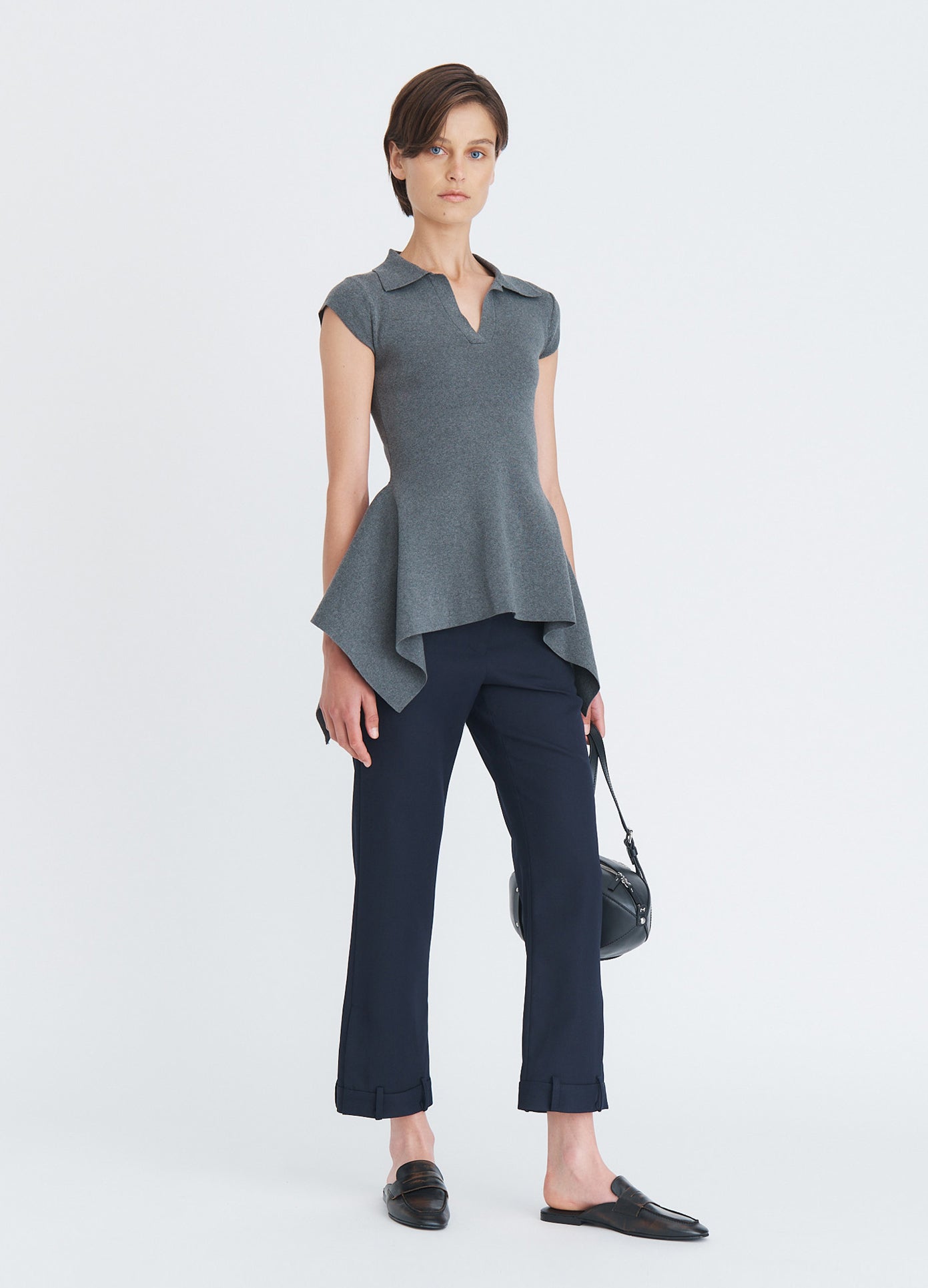 MONSE Napkin Hem Polo Knit Top in charcoal on model full front view