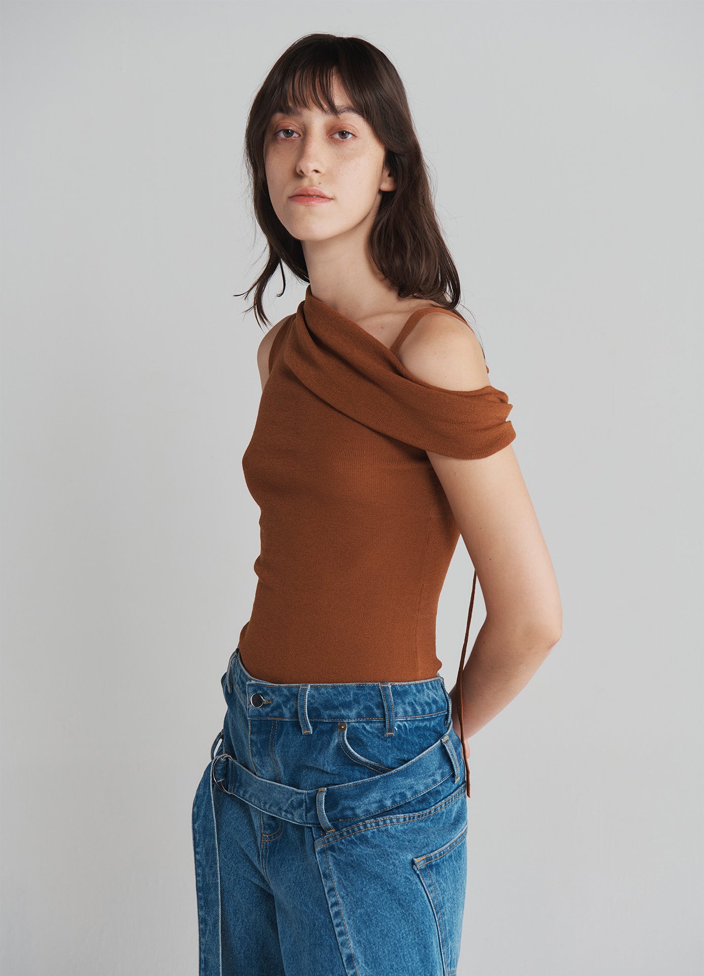 MONSE Off Shoulder Knitted Top in Brown on model side view