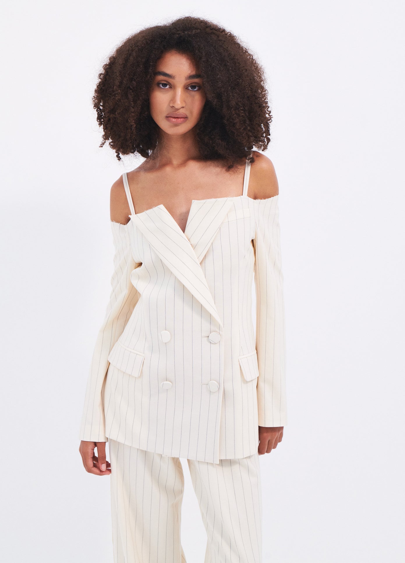 MONSE Off The Shoulder Pinstripe Blazer in Ivory on model front view