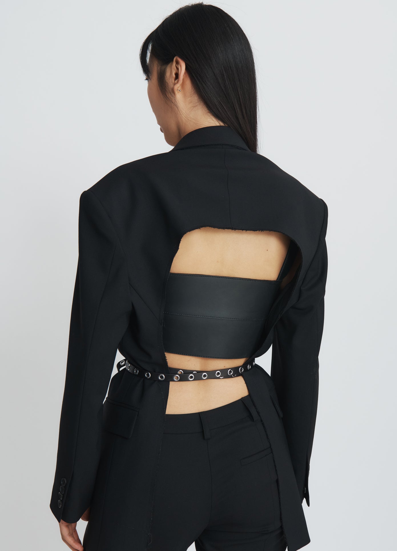 MONSE Open Back Jacket in black on model back view