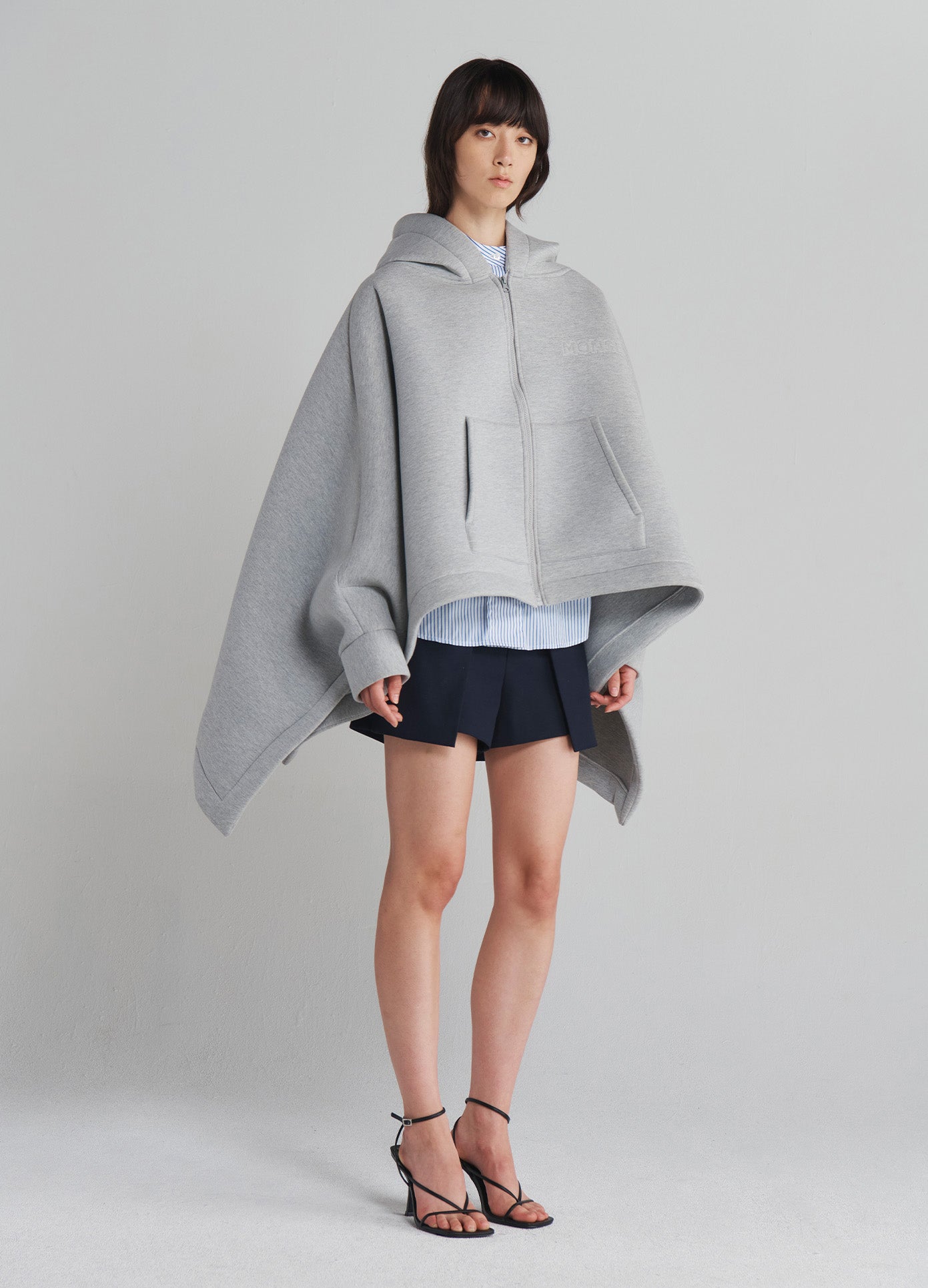 MONSE Oversized Zip-Up Hoodie in Grey on model full side view