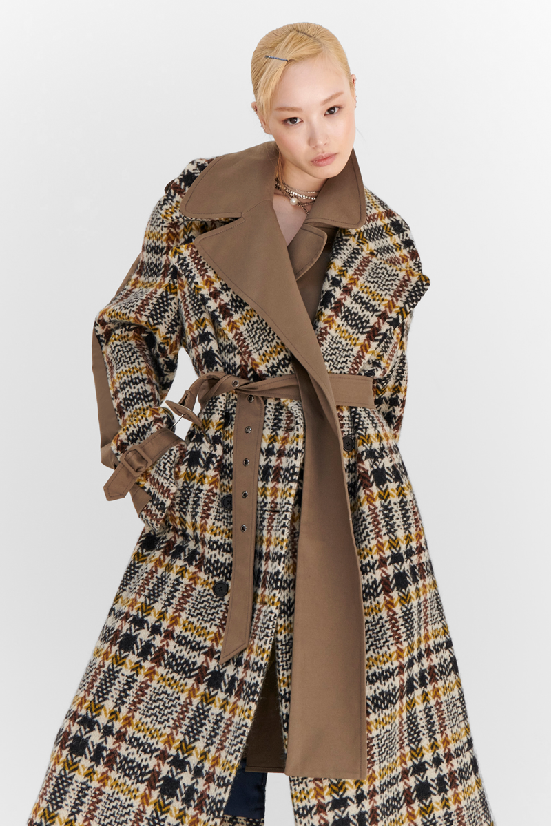 MONSE Resort 2024 Collection Vogue image of model wearing a checkered jacket