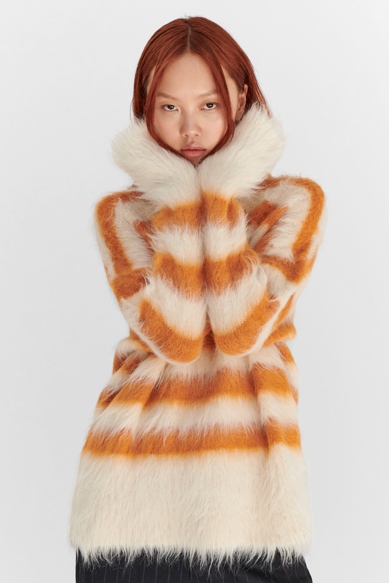 MONSE Resort 2024 Collection Vogue image of model wearing a mohair striped sweater