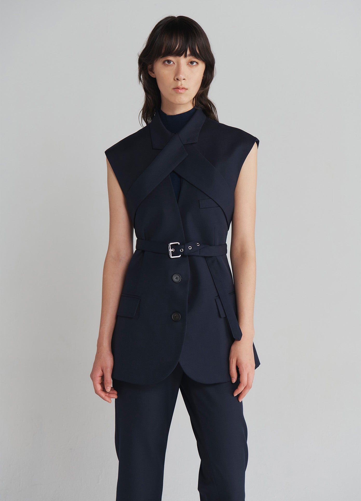 MONSE Sleeveless Criss Cross Front Jacket in Midnight on model front view