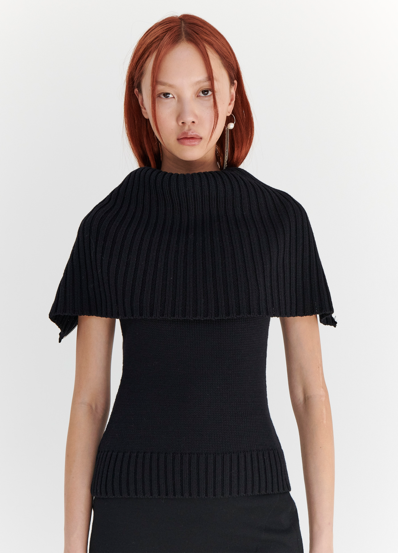 MONSE Sleeveless Double Collar Sweater in Black on model front view