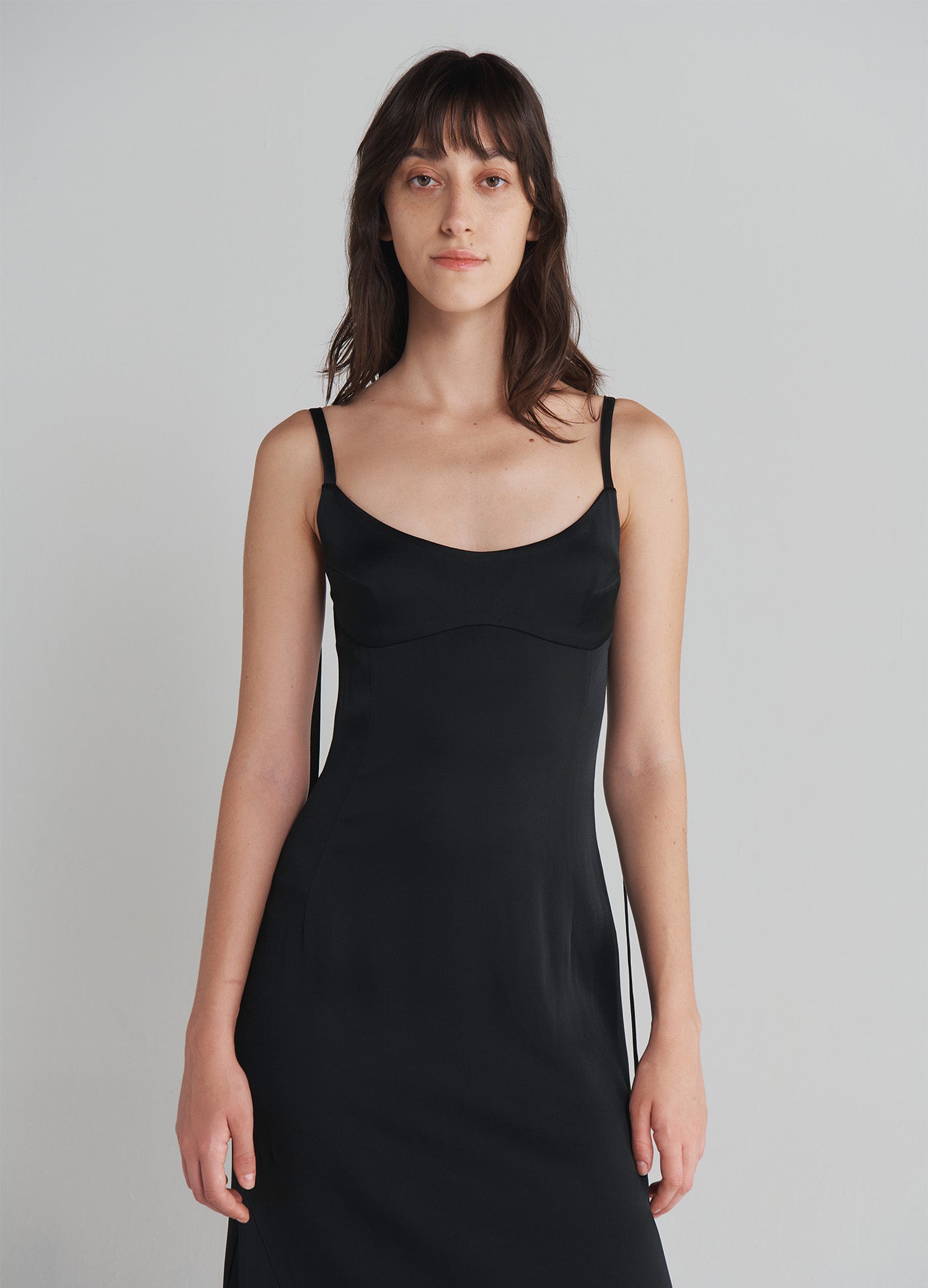 MONSE Slip Dress With Lace Hem in Black on model front view