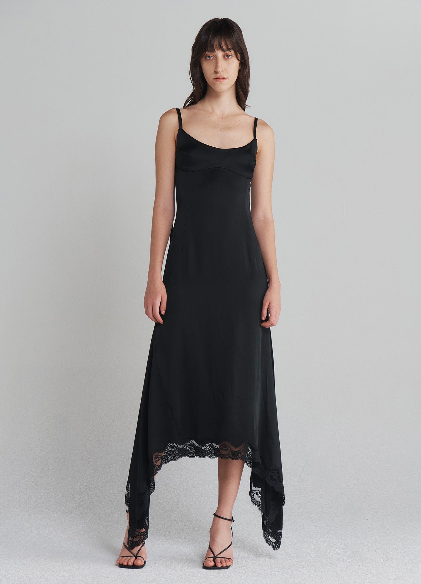 MONSE Slip Dress With Lace Hem in Black on model full front view