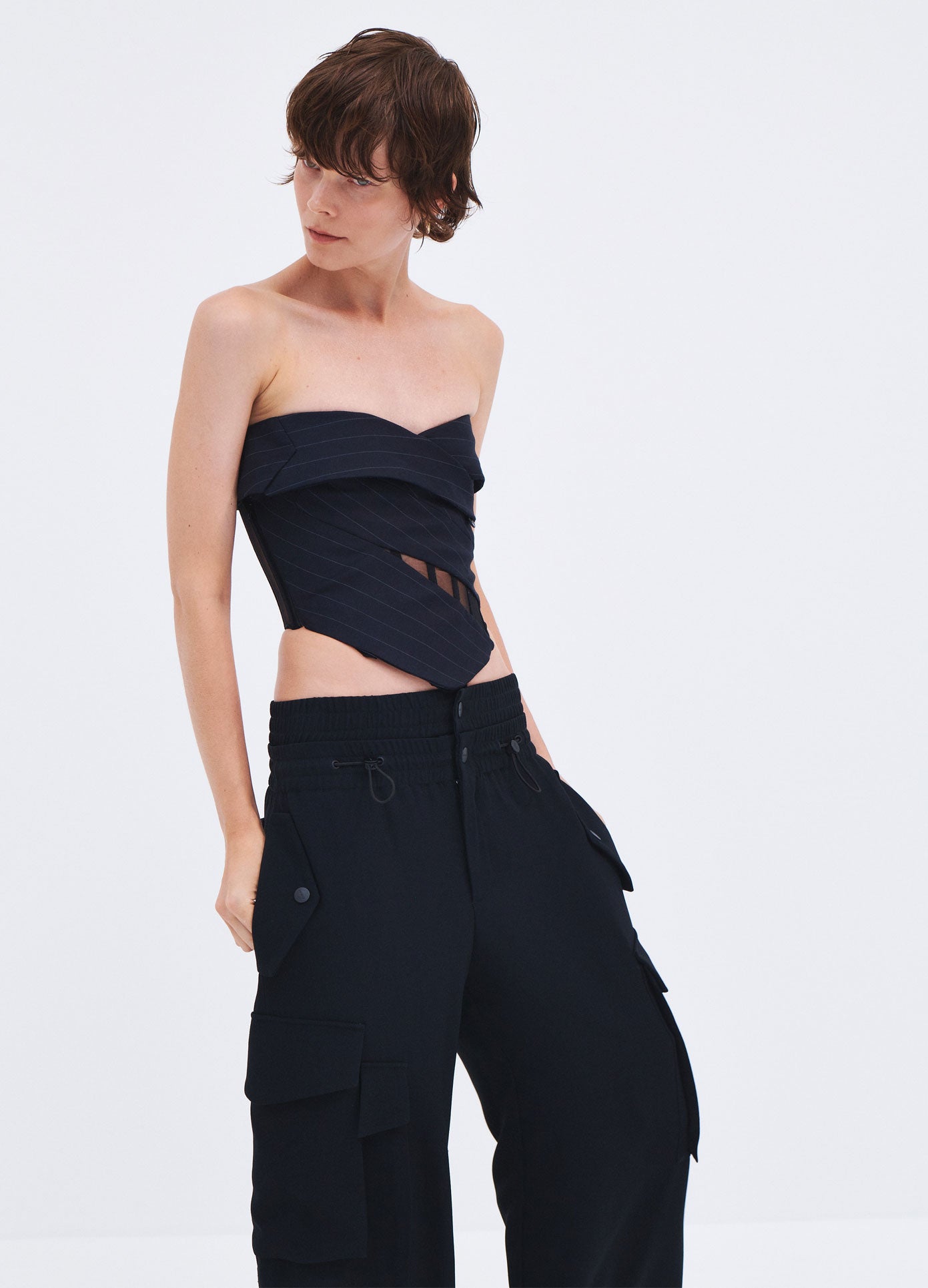 MONSE Spring 2024 Double Waistband Cargo Pants in Black on model front view
