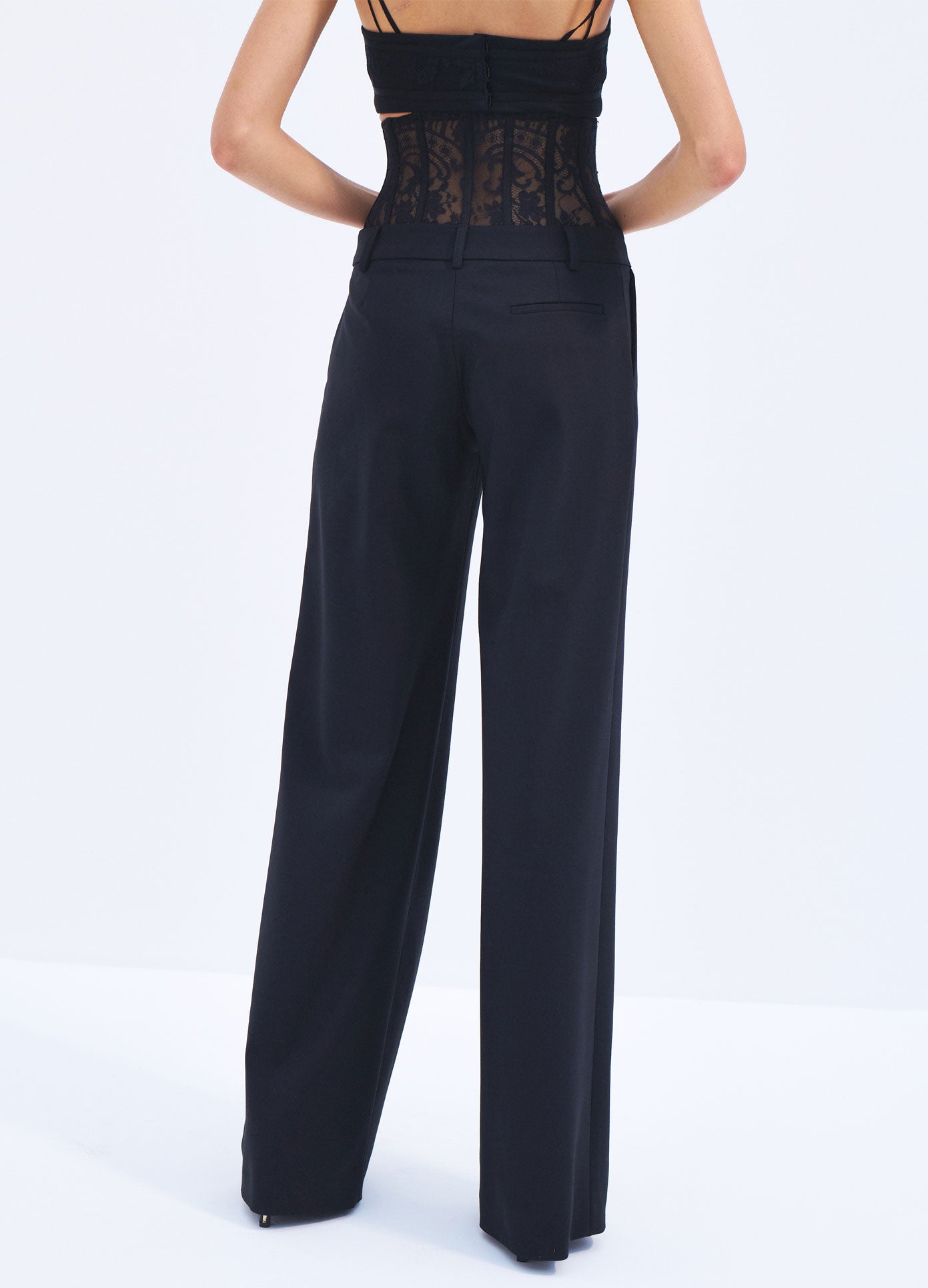 MONSE Spring 2024 Lace Bustier Trousers in Black on model back bottoms view