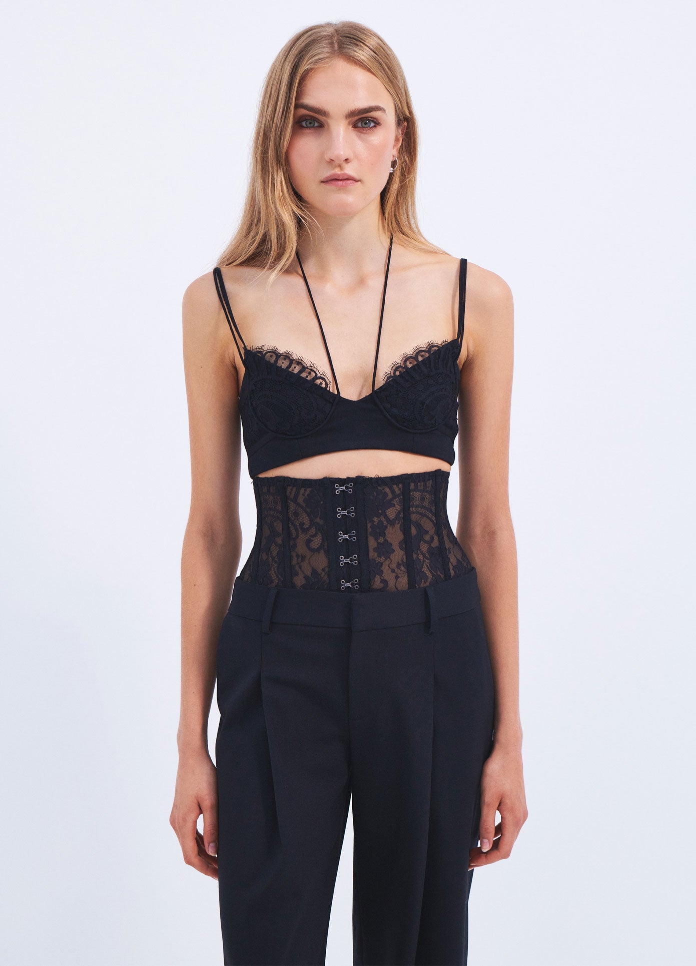 MONSE Spring 2024 Lace Bustier Trousers in Black on model front view