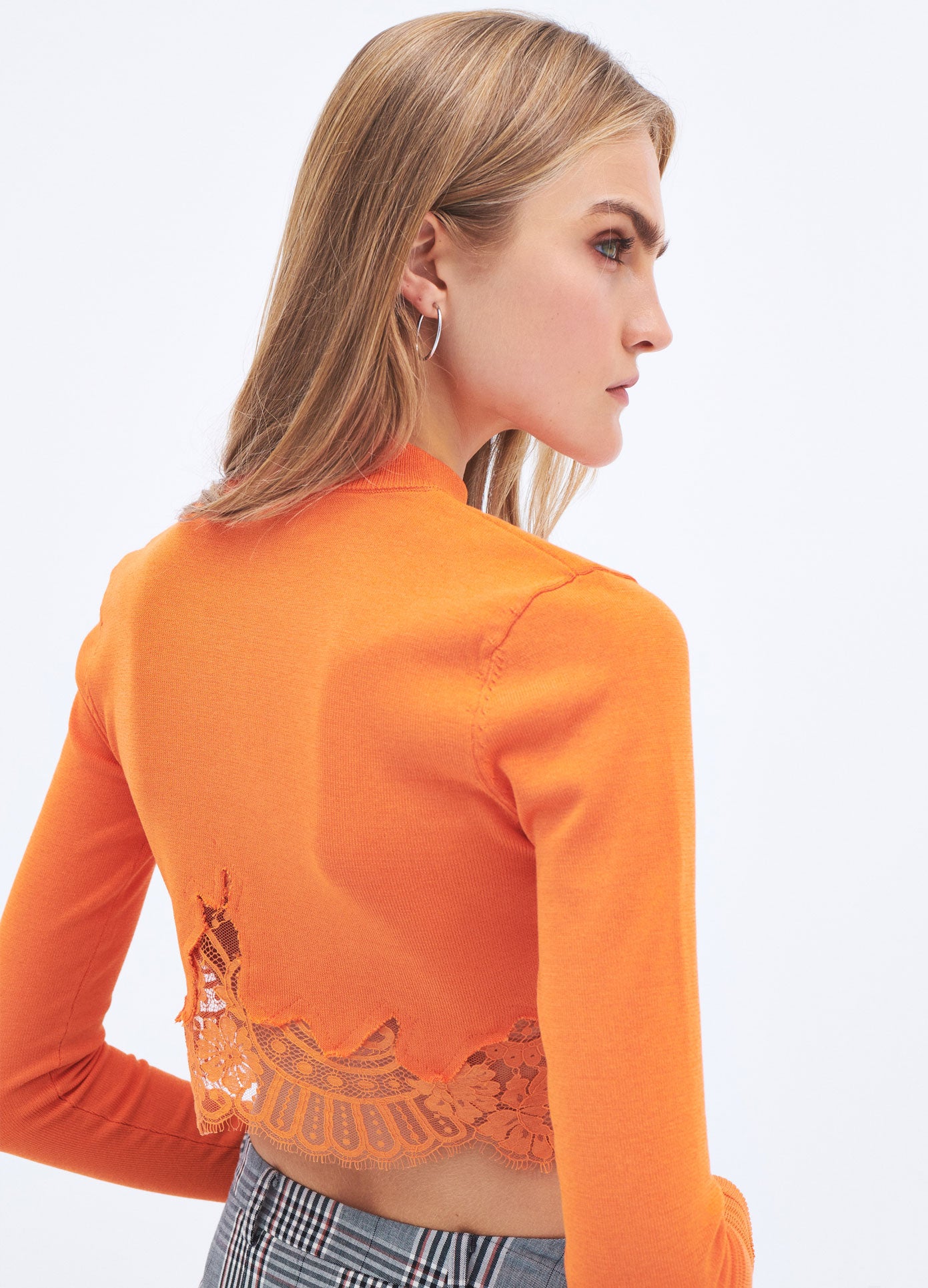 MONSE Spring 2024 Lace Hem Cropped Sweater in Orange on model back view