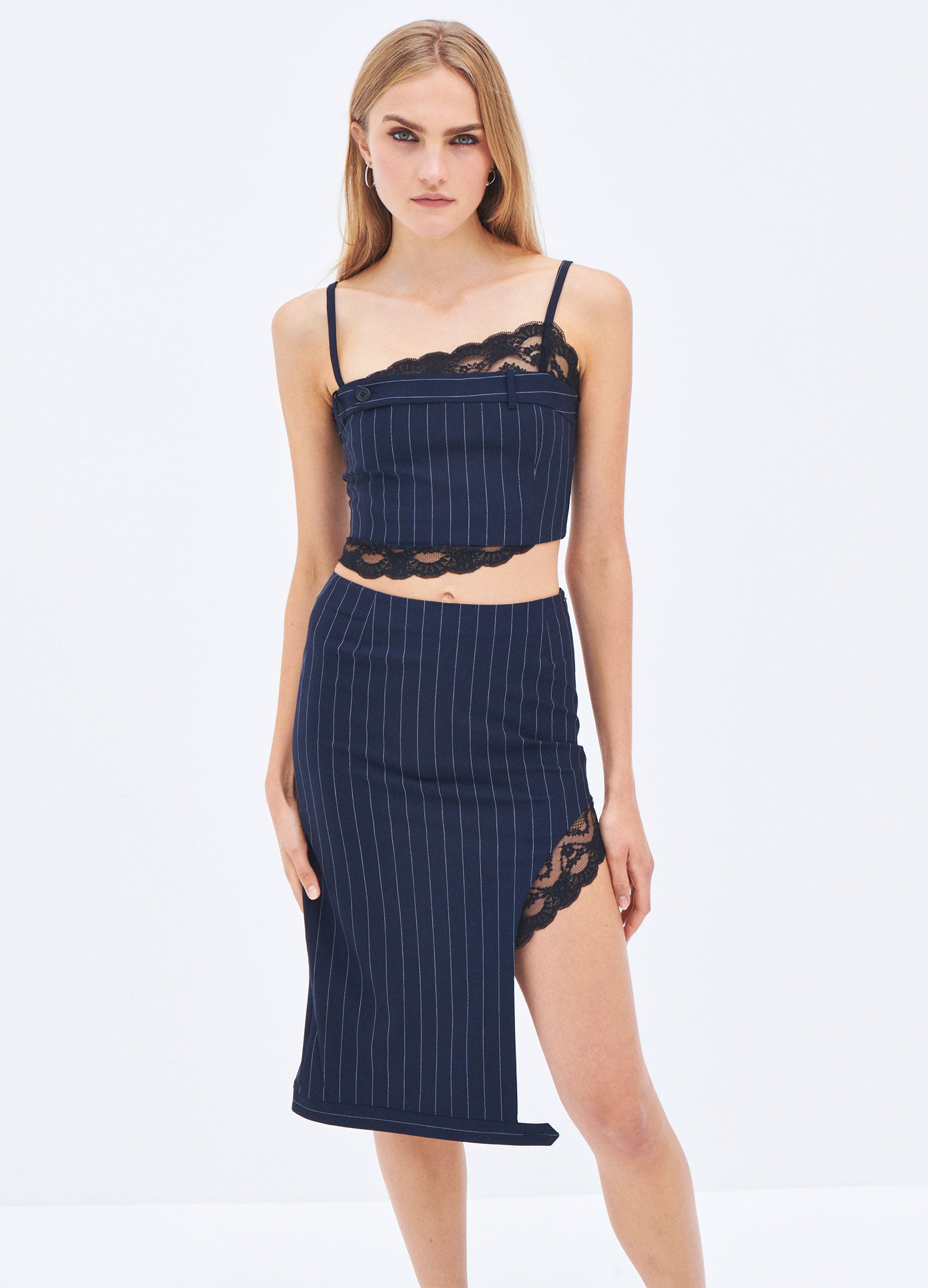 MONSE Spring 2024 Pinstripe Lace Trim Slit Skirt in Midnight on model front view