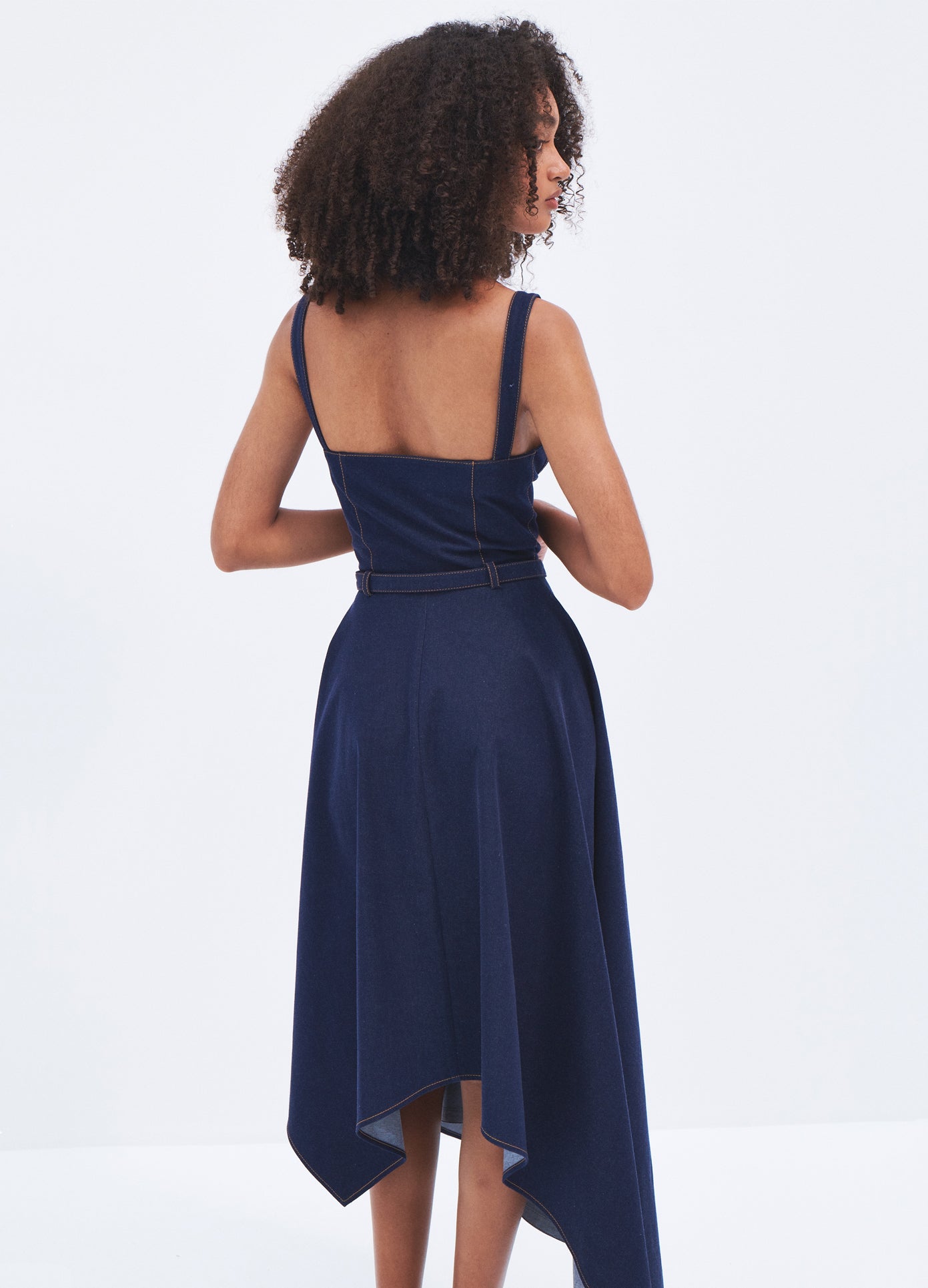 MONSE Stretch Denim Dress in Indigo on model back view