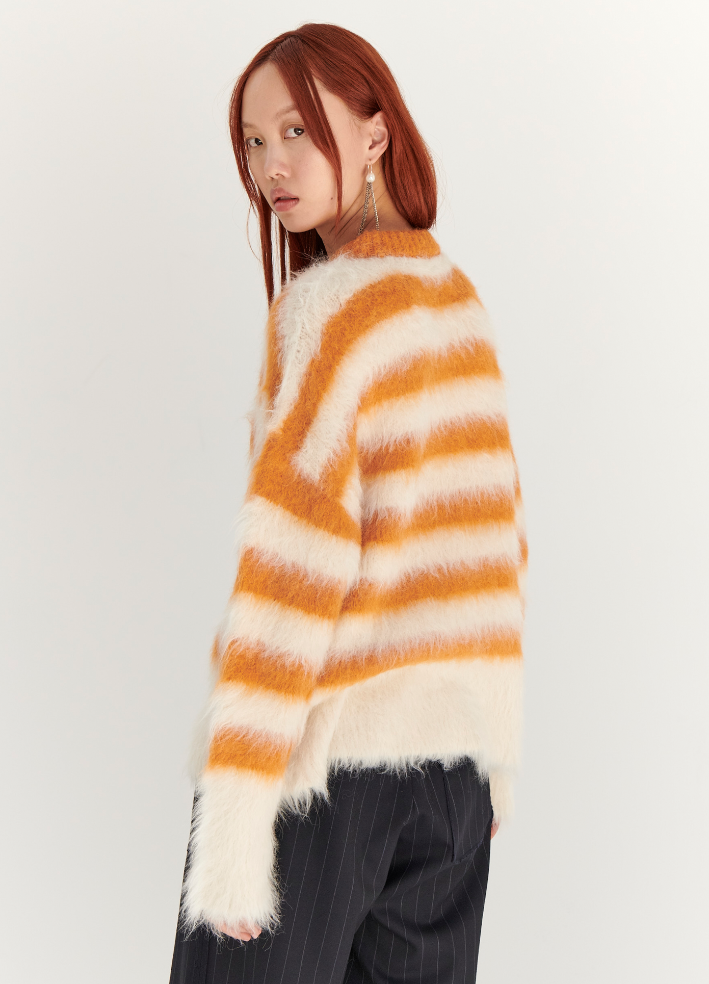 MONSE Striped Alpaca Sweater in White and Orange on model back view