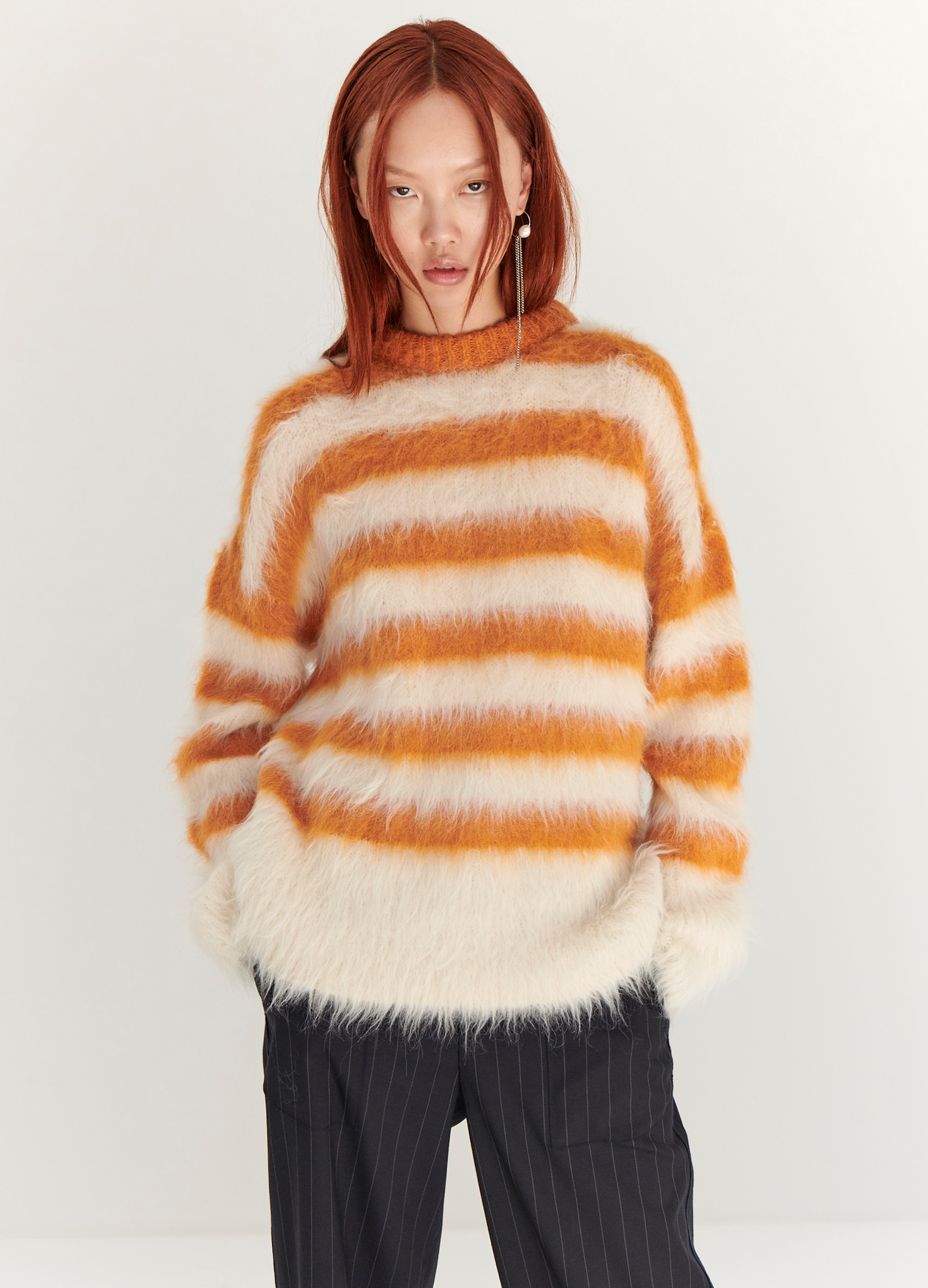 MONSE Striped Alpaca Sweater in White and Orange on model front view