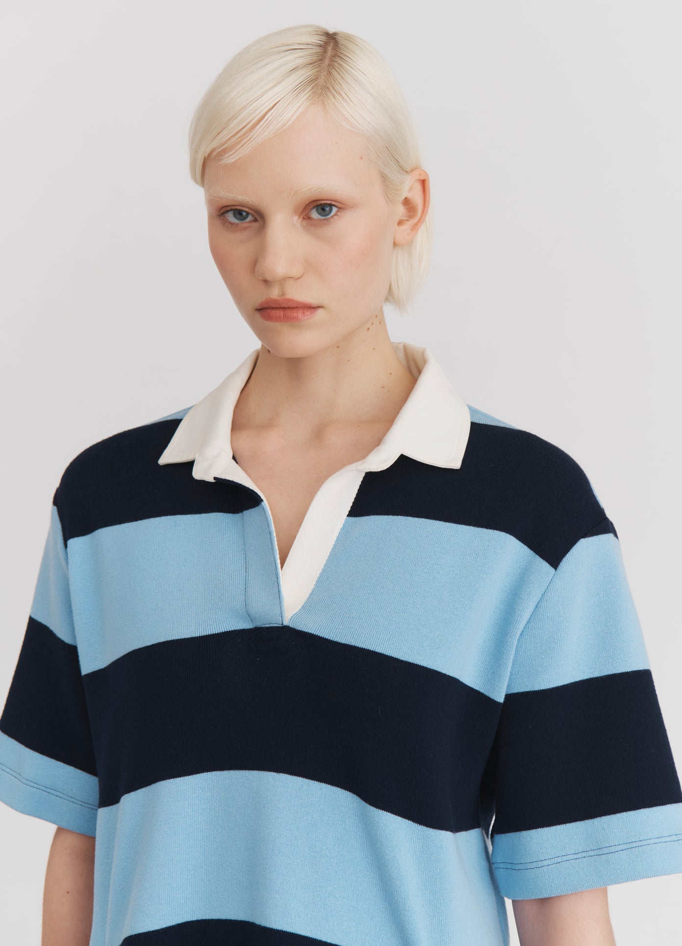 MONSE Striped Cascade Half Placket Knitted Top in Navy Stripe on model front detail view