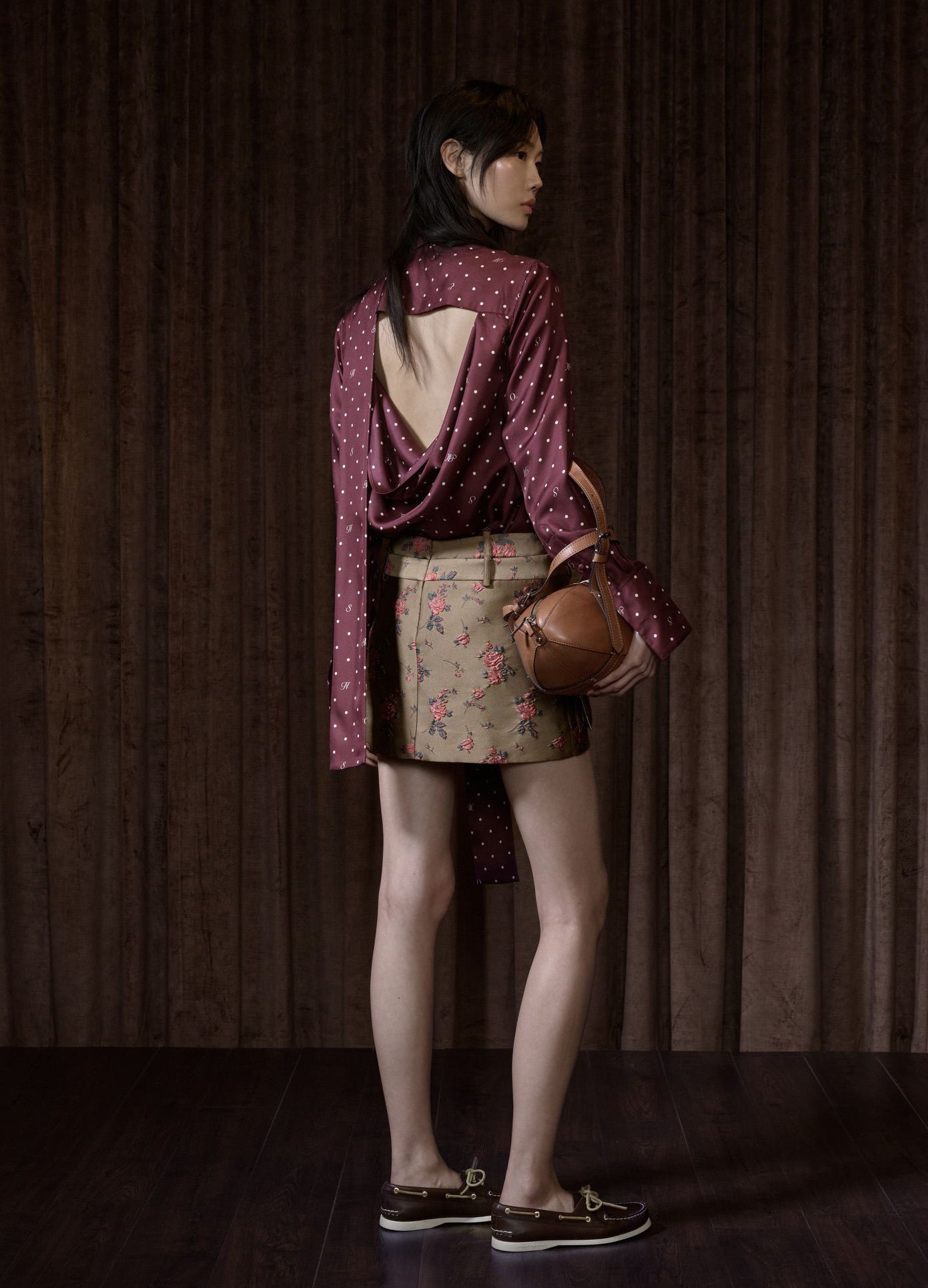 MONSE Tie Neck Cowl Back Blouse in burgundy on model full back view