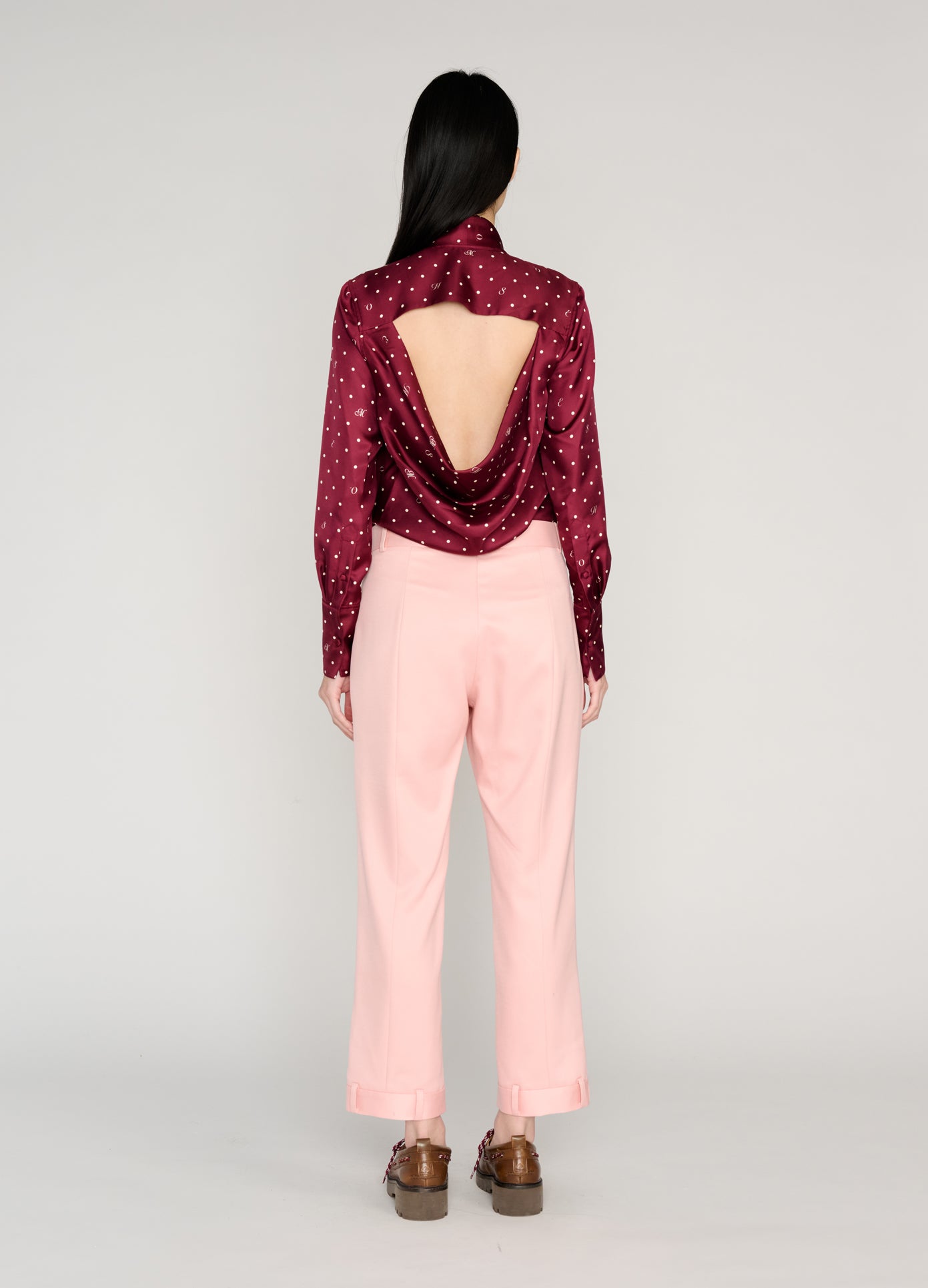 MONSE Tie Neck Cowl Back Blouse in burgundy on model full back view
