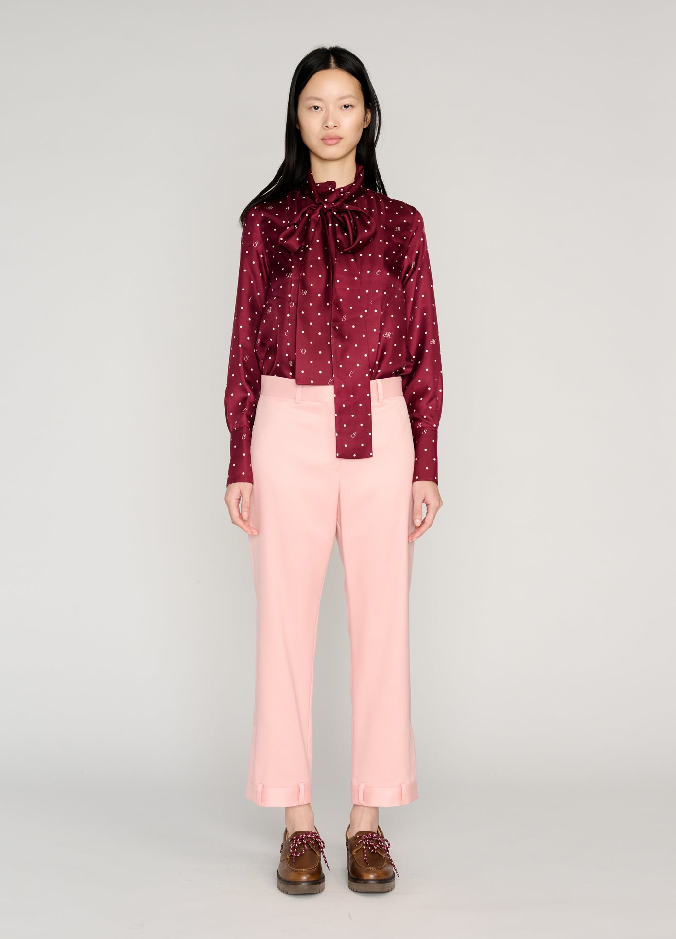 MONSE Tie Neck Cowl Back Blouse in burgundy on model full front view