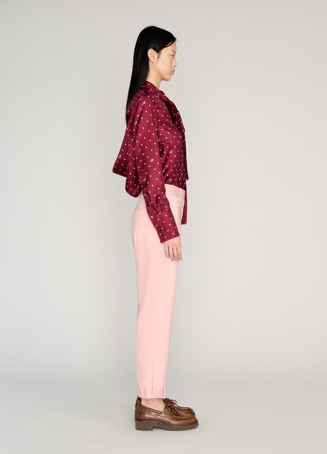 MONSE Tie Neck Cowl Back Blouse in burgundy on model full side view
